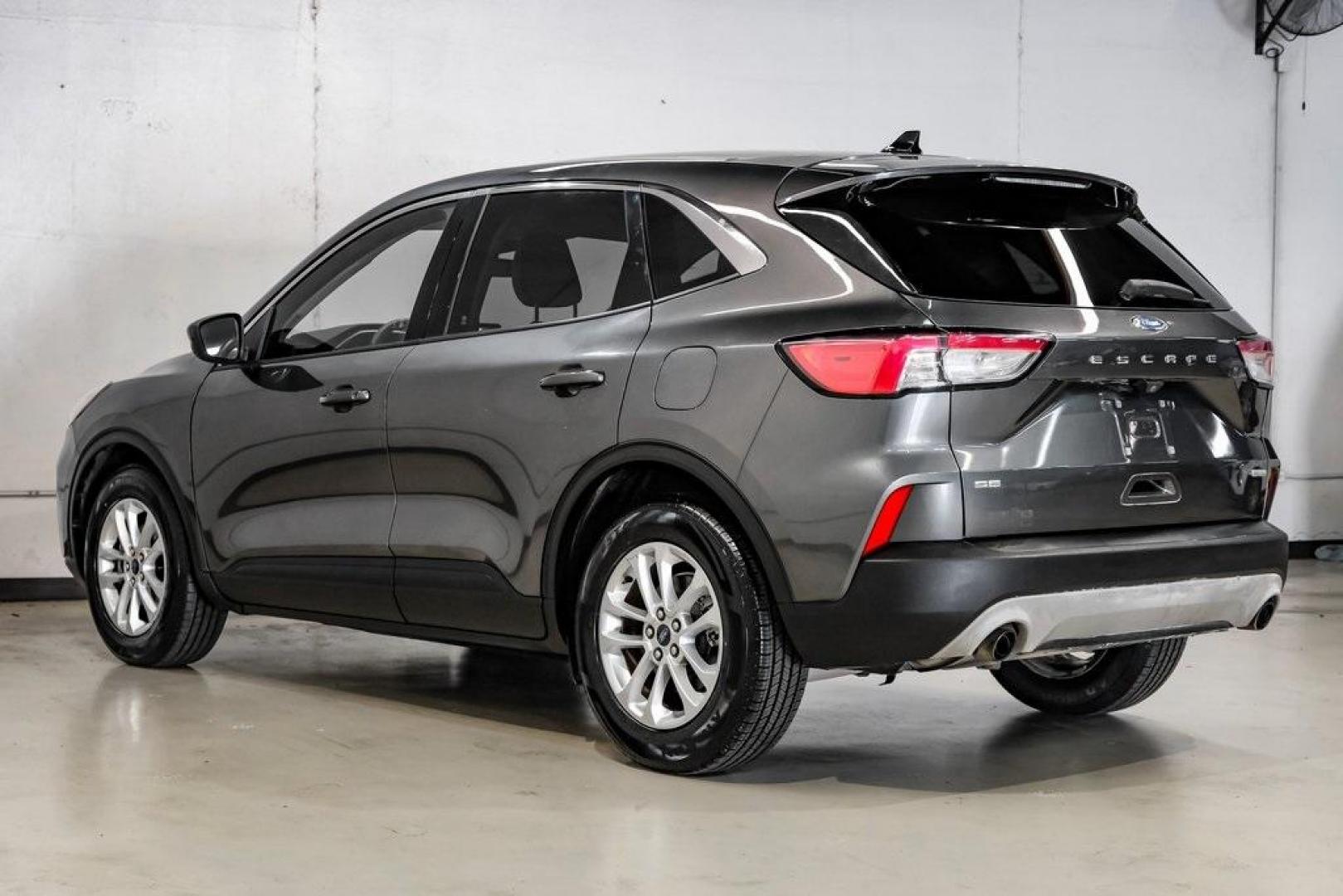 2020 Magnetic /Sandstone Ford Escape SE (1FMCU0G6XLU) with an 1.5L EcoBoost engine, Automatic transmission, located at 15300 Midway Rd., Addison, TX, 75001, (972) 702-0011, 32.958321, -96.838074 - Photo#15