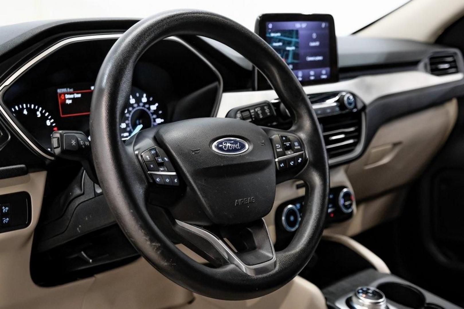 2020 Magnetic /Sandstone Ford Escape SE (1FMCU0G6XLU) with an 1.5L EcoBoost engine, Automatic transmission, located at 15300 Midway Rd., Addison, TX, 75001, (972) 702-0011, 32.958321, -96.838074 - Photo#22