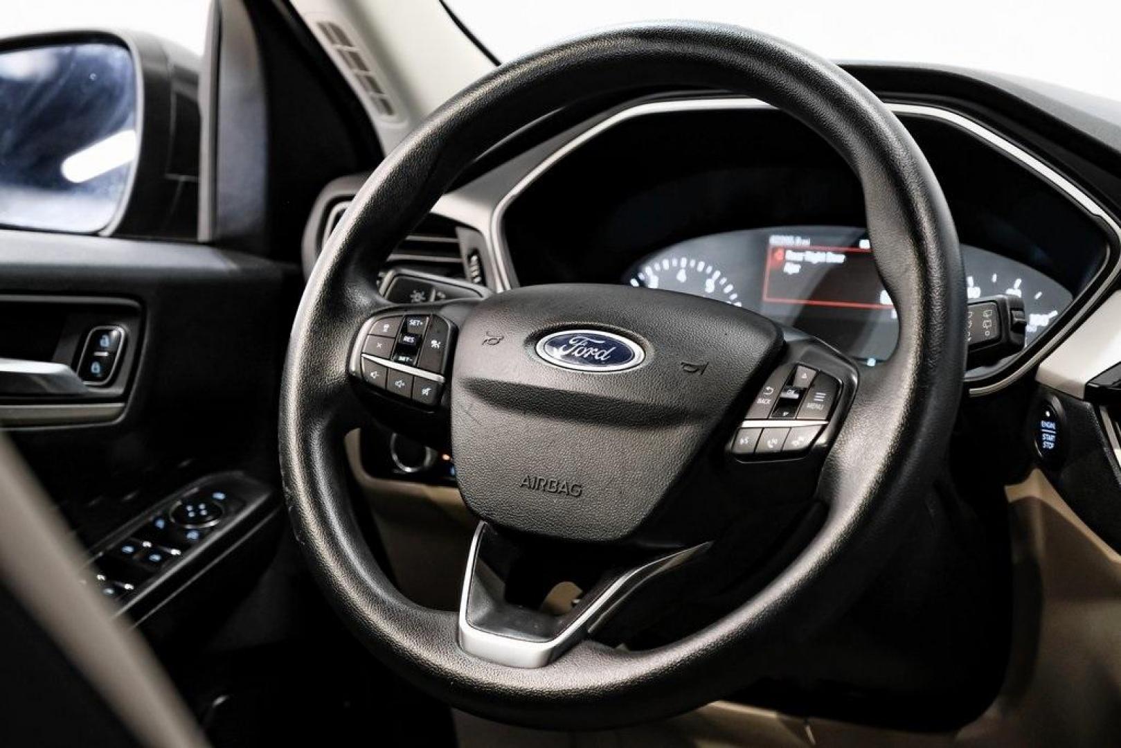 2020 Magnetic /Sandstone Ford Escape SE (1FMCU0G6XLU) with an 1.5L EcoBoost engine, Automatic transmission, located at 15300 Midway Rd., Addison, TX, 75001, (972) 702-0011, 32.958321, -96.838074 - Photo#23