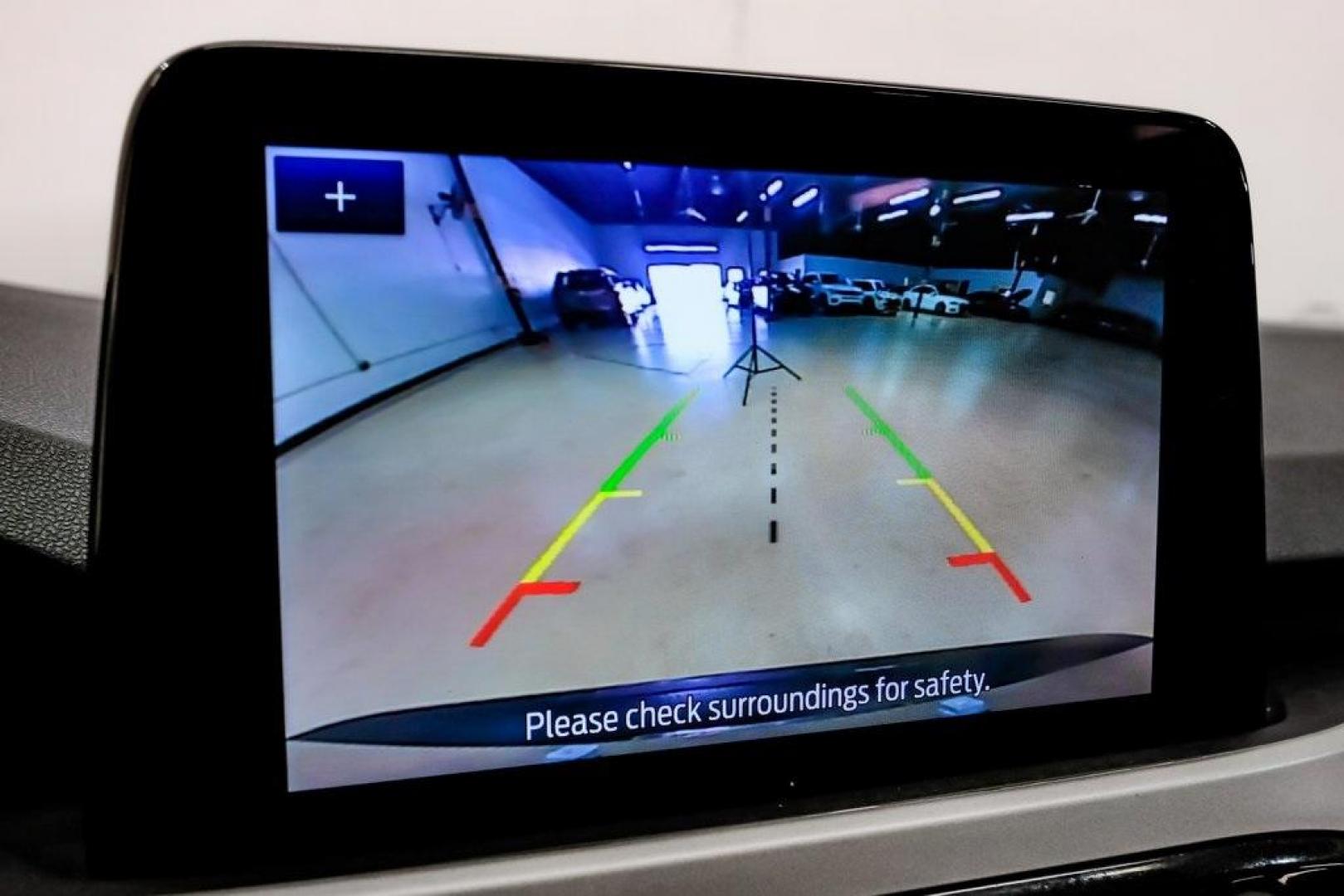 2020 Magnetic /Sandstone Ford Escape SE (1FMCU0G6XLU) with an 1.5L EcoBoost engine, Automatic transmission, located at 15300 Midway Rd., Addison, TX, 75001, (972) 702-0011, 32.958321, -96.838074 - Photo#30