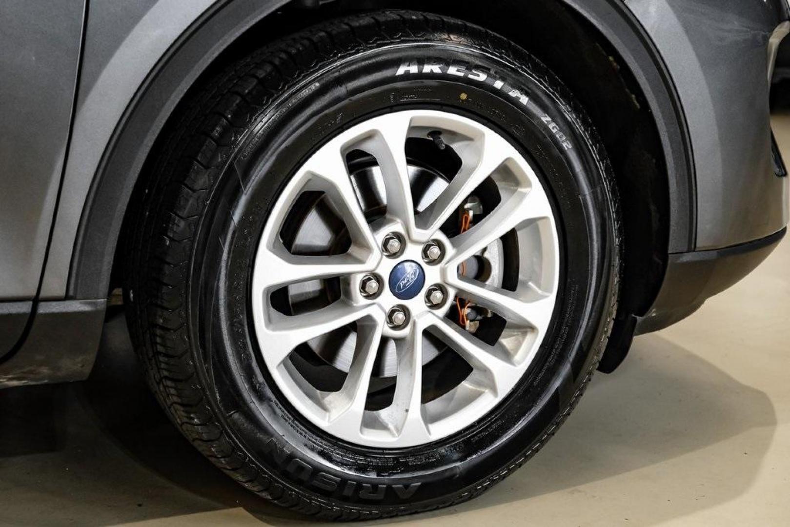 2020 Magnetic /Sandstone Ford Escape SE (1FMCU0G6XLU) with an 1.5L EcoBoost engine, Automatic transmission, located at 15300 Midway Rd., Addison, TX, 75001, (972) 702-0011, 32.958321, -96.838074 - Photo#65