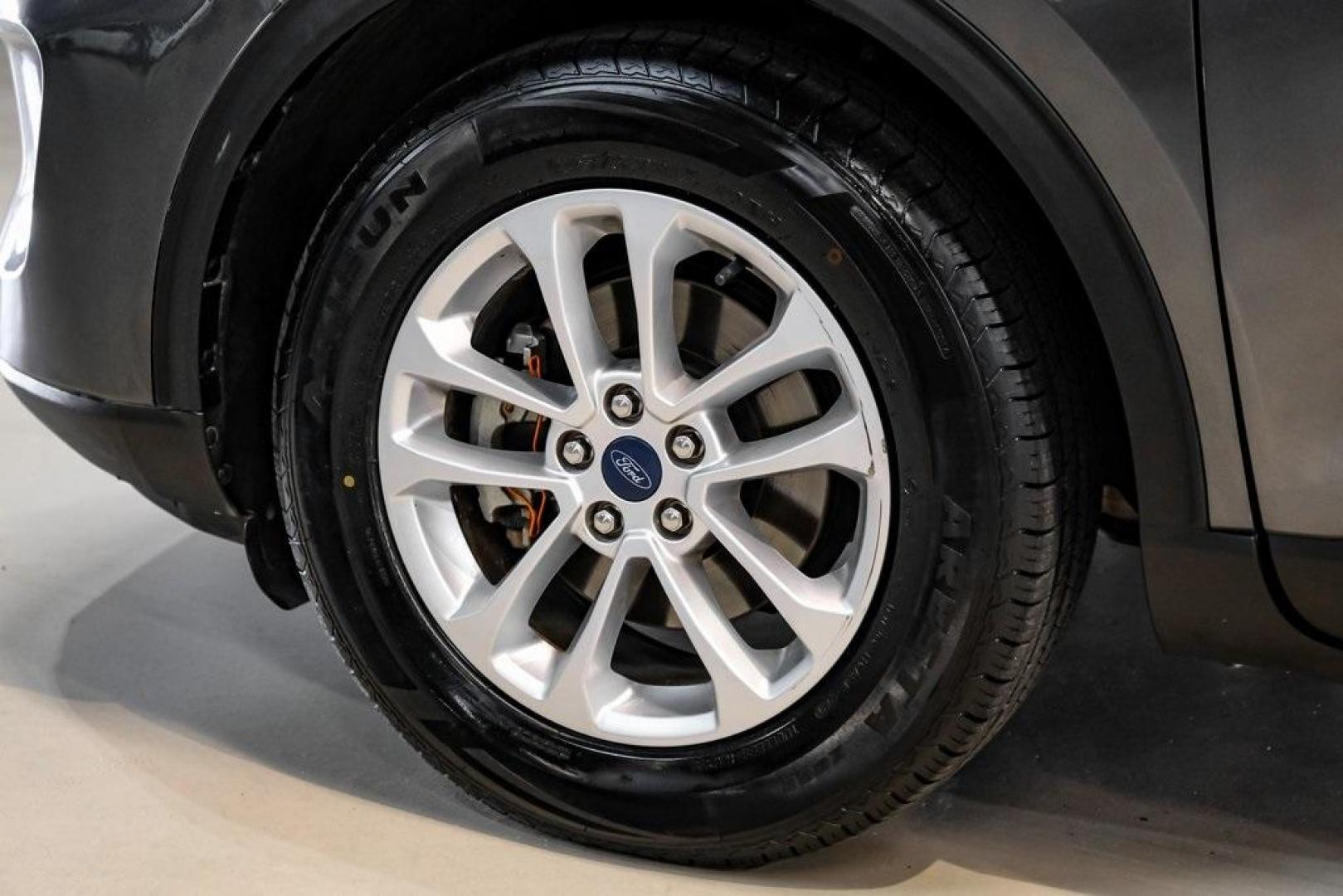 2020 Magnetic /Sandstone Ford Escape SE (1FMCU0G6XLU) with an 1.5L EcoBoost engine, Automatic transmission, located at 15300 Midway Rd., Addison, TX, 75001, (972) 702-0011, 32.958321, -96.838074 - Photo#66