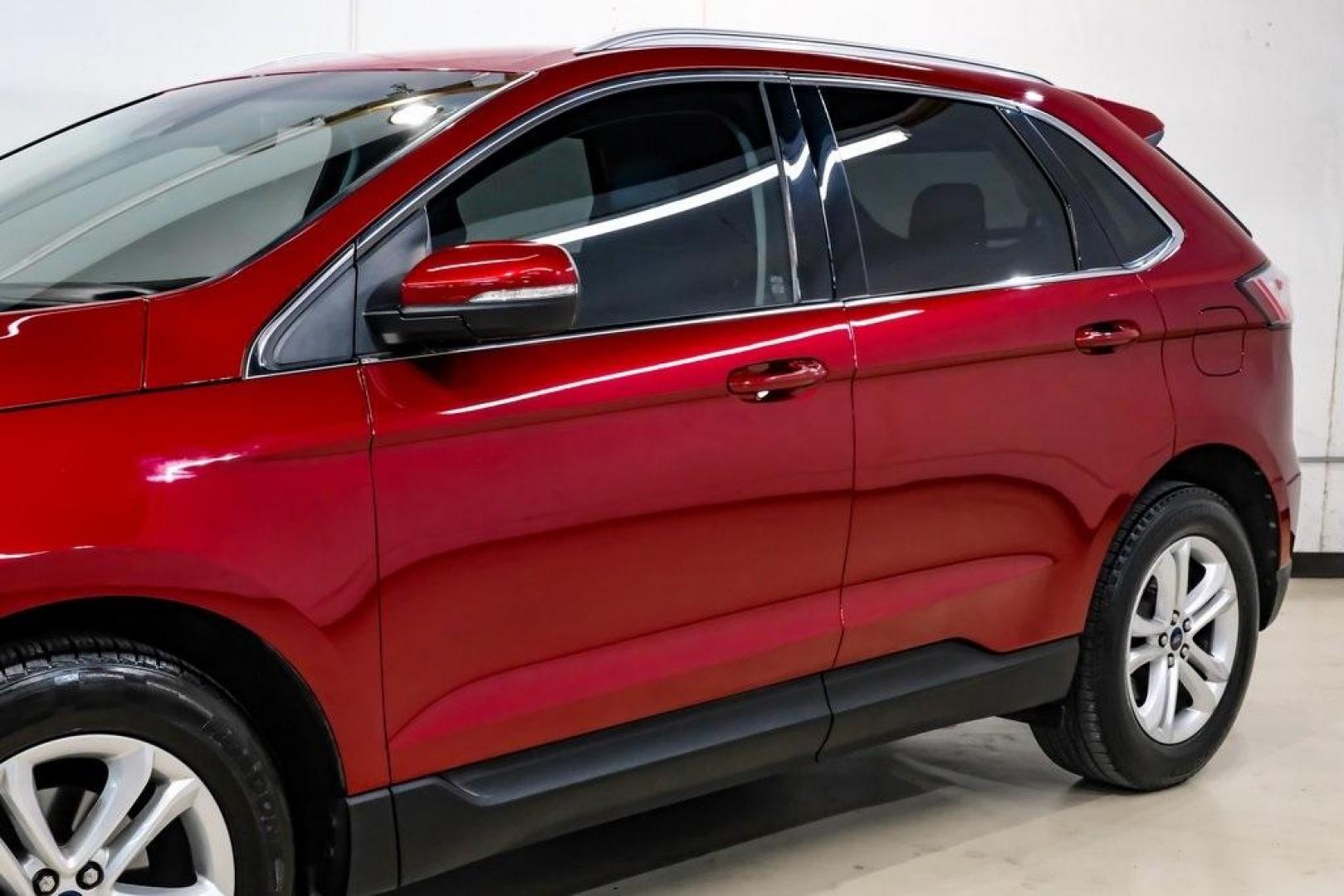 2019 Ruby Red /Ebony Ford Edge SEL (2FMPK3J95KB) with an EcoBoost 2.0L I4 GTDi DOHC Turbocharged VCT engine, Automatic transmission, located at 15300 Midway Rd., Addison, TX, 75001, (972) 702-0011, 32.958321, -96.838074 - Photo#5