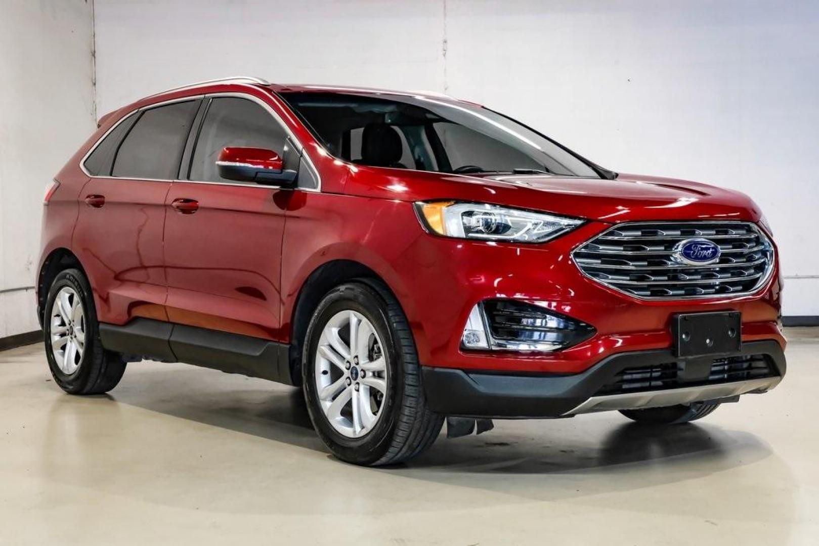 2019 Ruby Red /Ebony Ford Edge SEL (2FMPK3J95KB) with an EcoBoost 2.0L I4 GTDi DOHC Turbocharged VCT engine, Automatic transmission, located at 15300 Midway Rd., Addison, TX, 75001, (972) 702-0011, 32.958321, -96.838074 - Photo#7