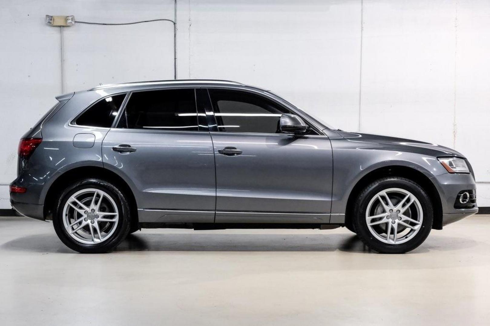 2016 Monsoon Gray Metallic /Black Audi Q5 2.0T Premium Plus (WA1L2AFP9GA) with an 2.0L 4-Cylinder TFSI engine, Automatic transmission, located at 15300 Midway Rd., Addison, TX, 75001, (972) 702-0011, 32.958321, -96.838074 - Photo#11