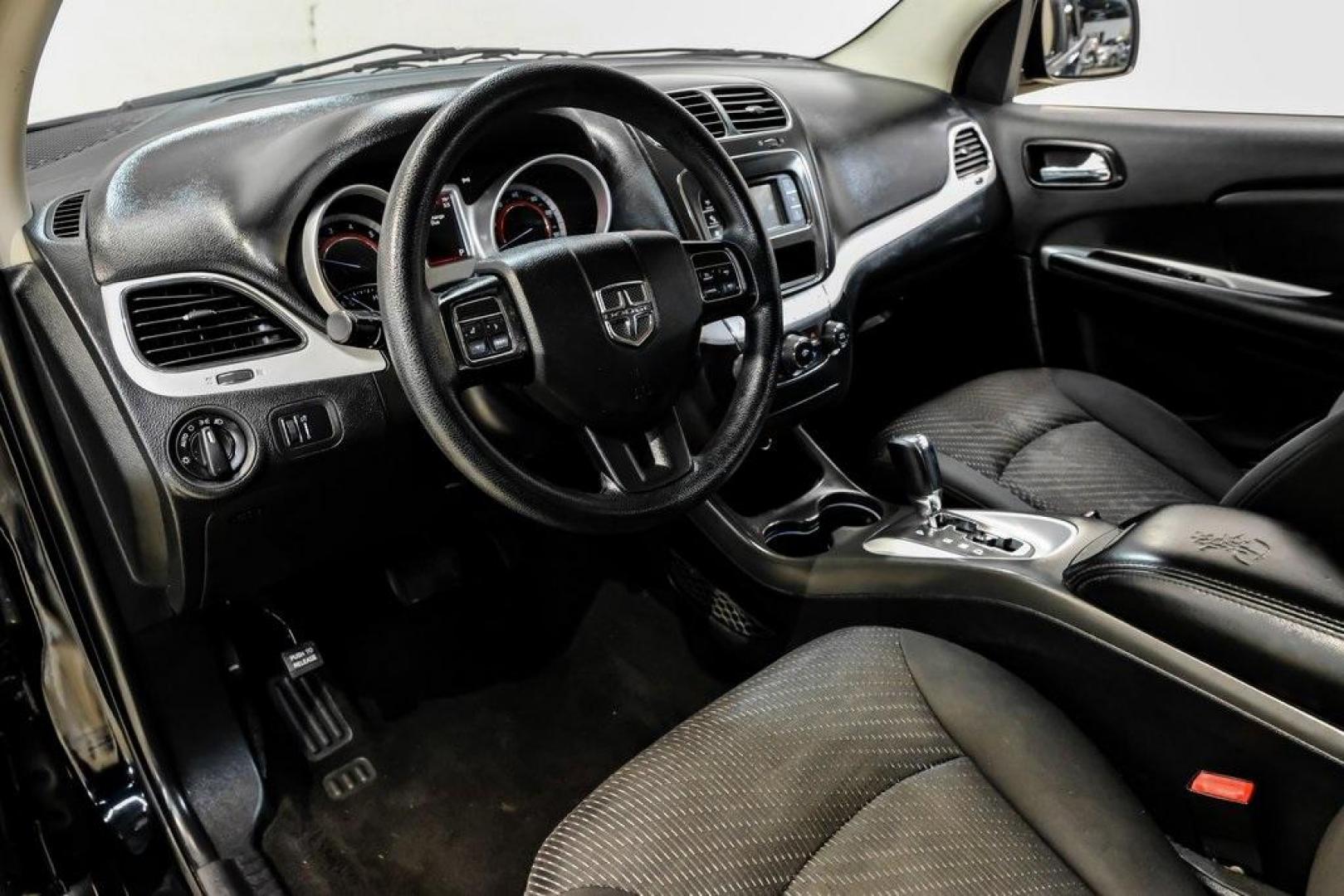 2017 Pitch Black Clearcoat /Black Dodge Journey SE (3C4PDCAB3HT) with an 2.4L I4 DOHC 16V Dual VVT engine, Automatic transmission, located at 15300 Midway Rd., Addison, TX, 75001, (972) 702-0011, 32.958321, -96.838074 - Photo#18