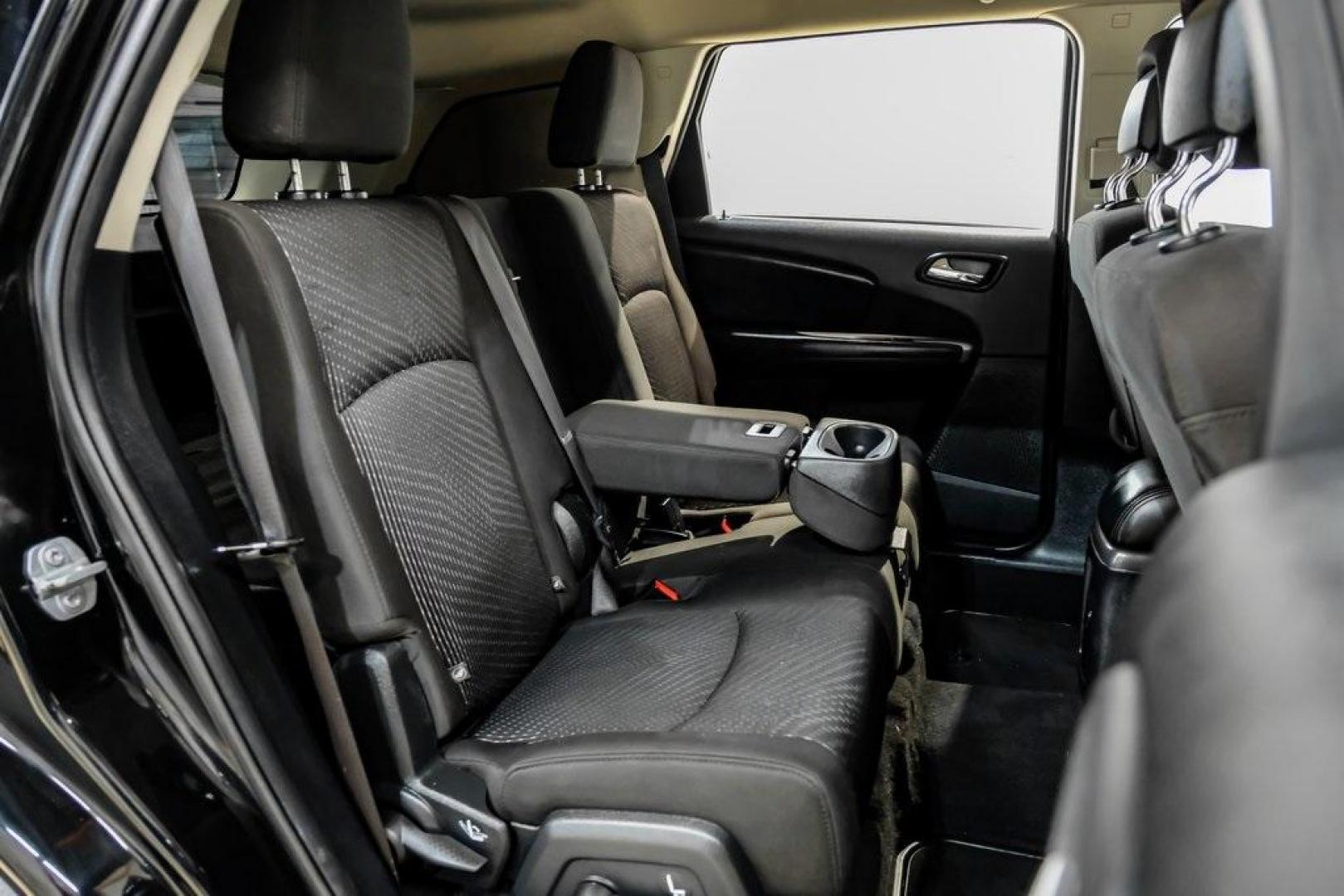 2017 Pitch Black Clearcoat /Black Dodge Journey SE (3C4PDCAB3HT) with an 2.4L I4 DOHC 16V Dual VVT engine, Automatic transmission, located at 15300 Midway Rd., Addison, TX, 75001, (972) 702-0011, 32.958321, -96.838074 - Photo#34