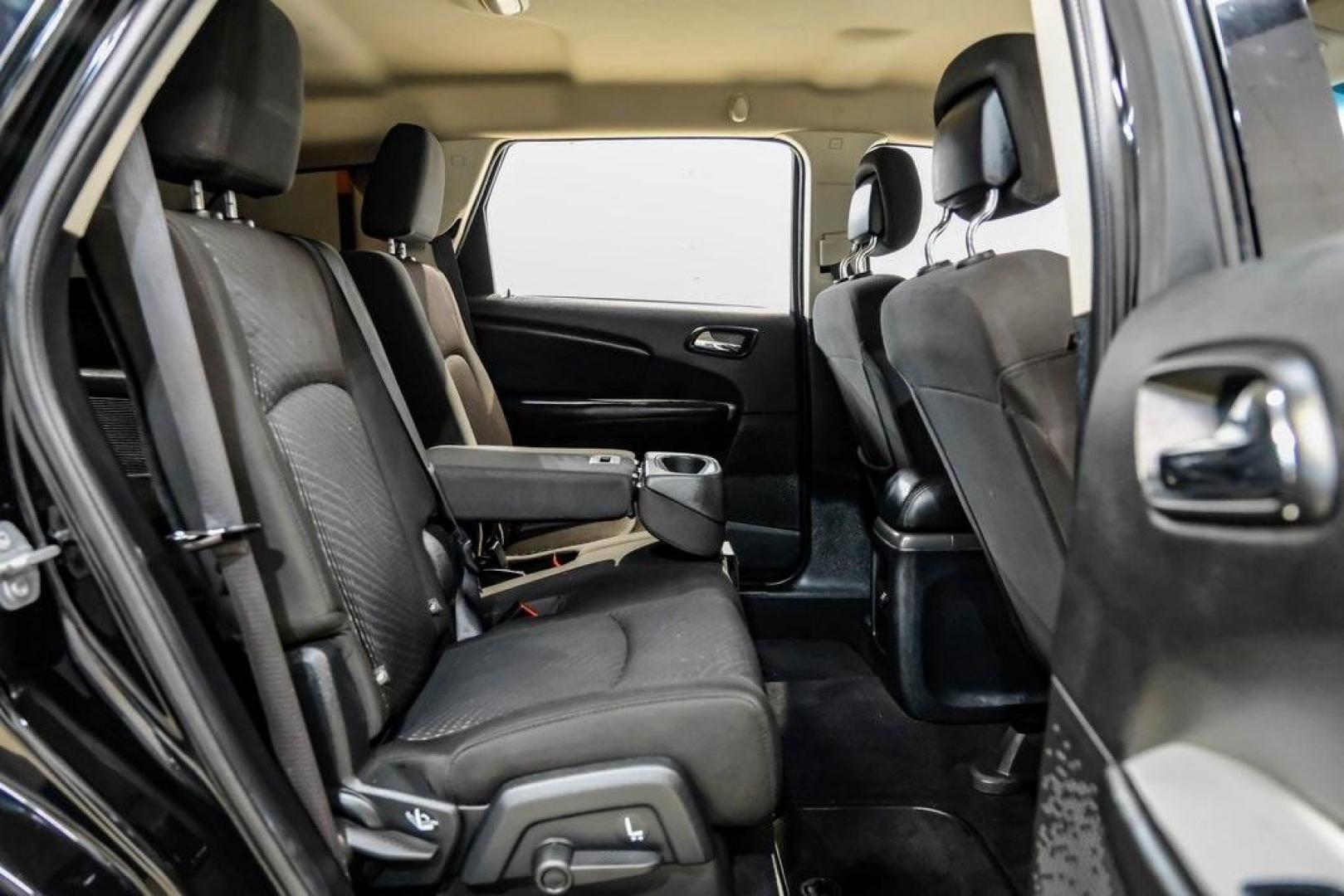 2017 Pitch Black Clearcoat /Black Dodge Journey SE (3C4PDCAB3HT) with an 2.4L I4 DOHC 16V Dual VVT engine, Automatic transmission, located at 15300 Midway Rd., Addison, TX, 75001, (972) 702-0011, 32.958321, -96.838074 - Photo#35