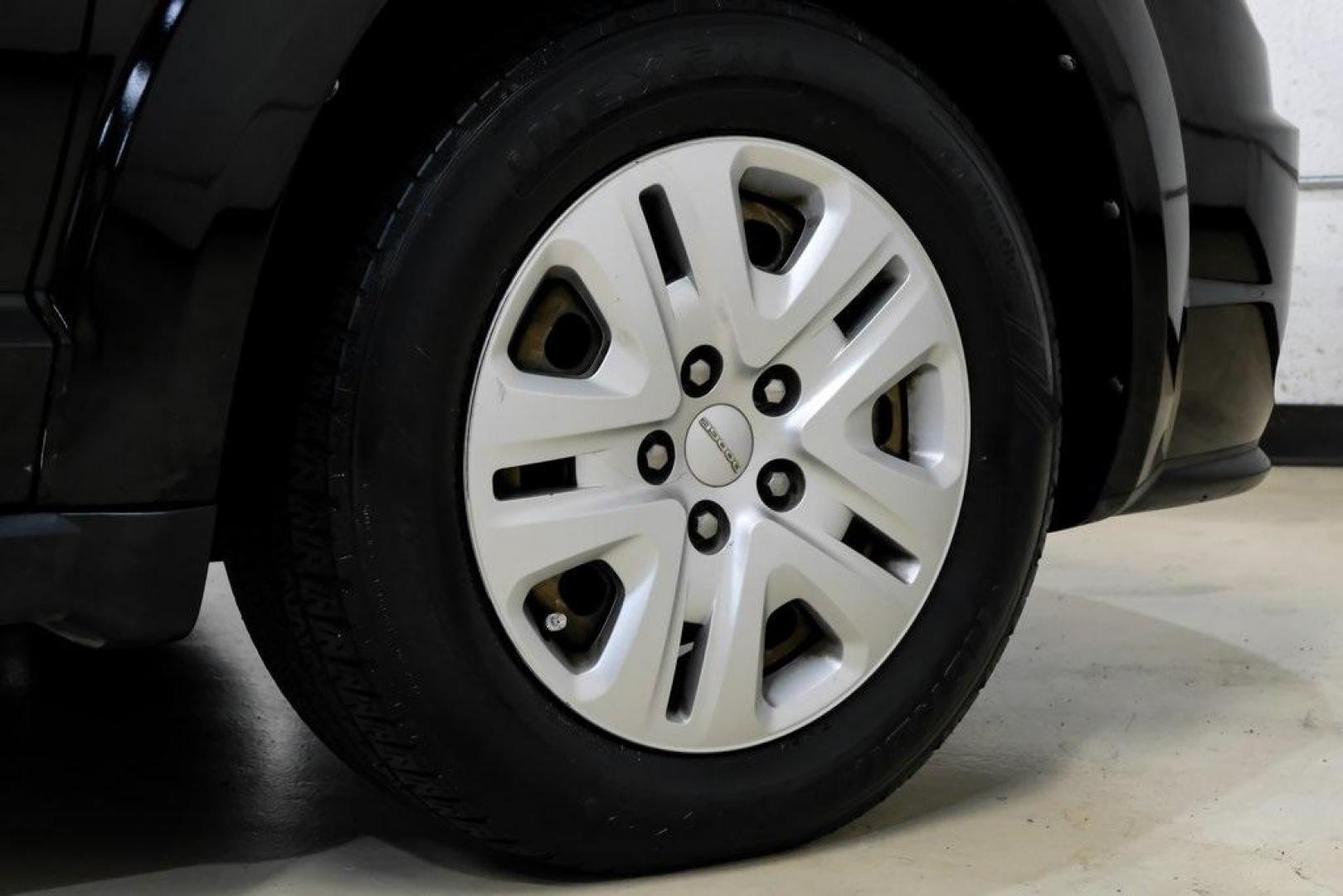 2017 Pitch Black Clearcoat /Black Dodge Journey SE (3C4PDCAB3HT) with an 2.4L I4 DOHC 16V Dual VVT engine, Automatic transmission, located at 15300 Midway Rd., Addison, TX, 75001, (972) 702-0011, 32.958321, -96.838074 - Photo#52