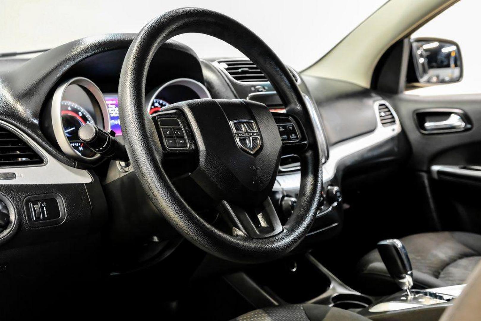 2017 Pitch Black Clearcoat /Black Dodge Journey SE (3C4PDCAB3HT) with an 2.4L I4 DOHC 16V Dual VVT engine, Automatic transmission, located at 15300 Midway Rd., Addison, TX, 75001, (972) 702-0011, 32.958321, -96.838074 - 2017 Dodge Journey SE<br><br>Now Available at Midway Auto Group, Addison, Texas<br><br>Practical, versatile, and budget-friendly, the 2017 Dodge Journey SE is a midsize SUV that delivers space, comfort, and value. With flexible seating, strong reliability, and a smooth driving feel, the Journey SE i - Photo#2