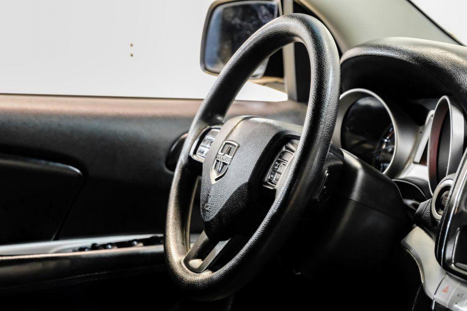 2017 Pitch Black Clearcoat /Black Dodge Journey SE (3C4PDCAB3HT) with an 2.4L I4 DOHC 16V Dual VVT engine, Automatic transmission, located at 15300 Midway Rd., Addison, TX, 75001, (972) 702-0011, 32.958321, -96.838074 - 2017 Dodge Journey SE<br><br>Now Available at Midway Auto Group, Addison, Texas<br><br>Practical, versatile, and budget-friendly, the 2017 Dodge Journey SE is a midsize SUV that delivers space, comfort, and value. With flexible seating, strong reliability, and a smooth driving feel, the Journey SE i - Photo#16