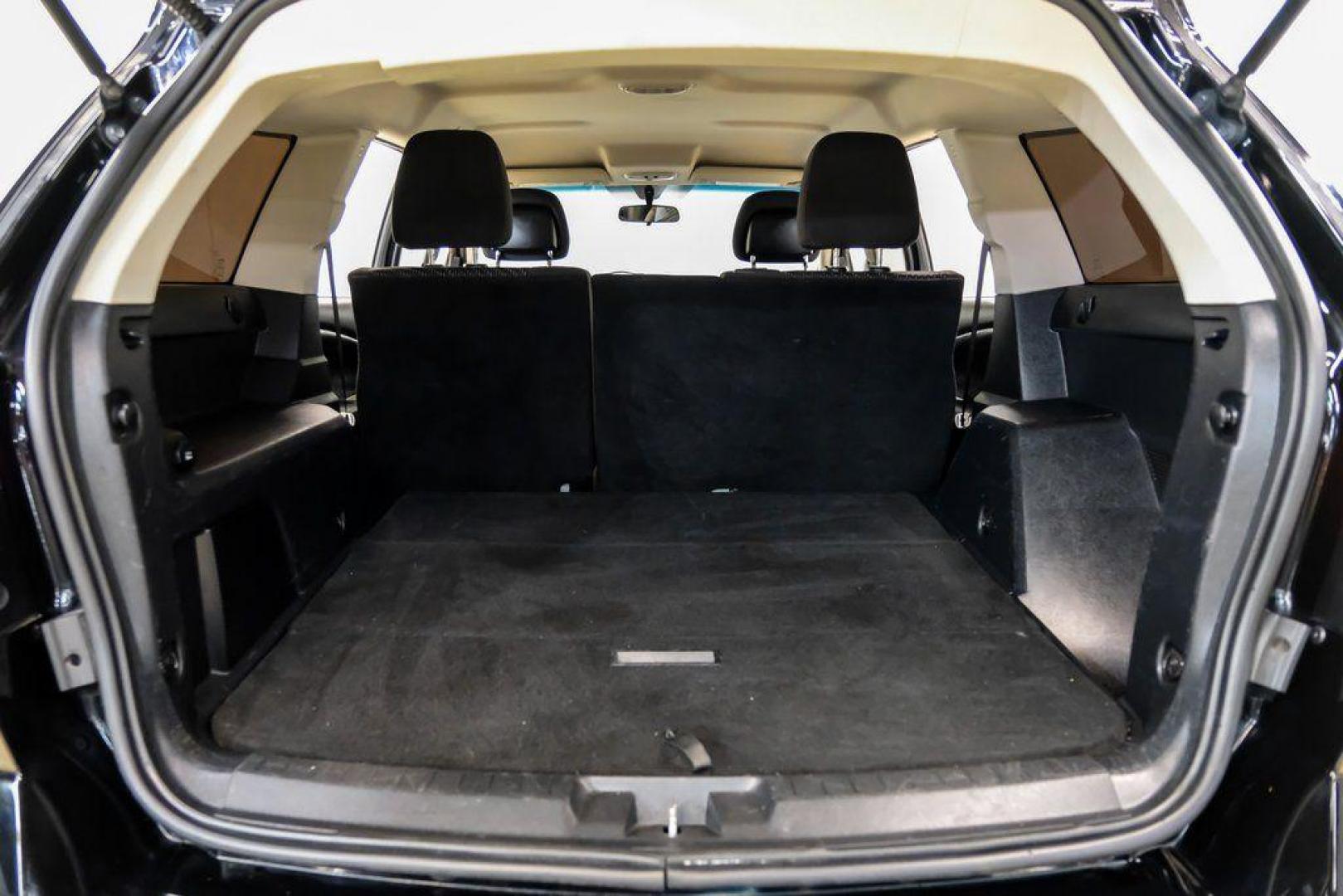 2017 Pitch Black Clearcoat /Black Dodge Journey SE (3C4PDCAB3HT) with an 2.4L I4 DOHC 16V Dual VVT engine, Automatic transmission, located at 15300 Midway Rd., Addison, TX, 75001, (972) 702-0011, 32.958321, -96.838074 - 2017 Dodge Journey SE<br><br>Now Available at Midway Auto Group, Addison, Texas<br><br>Practical, versatile, and budget-friendly, the 2017 Dodge Journey SE is a midsize SUV that delivers space, comfort, and value. With flexible seating, strong reliability, and a smooth driving feel, the Journey SE i - Photo#49