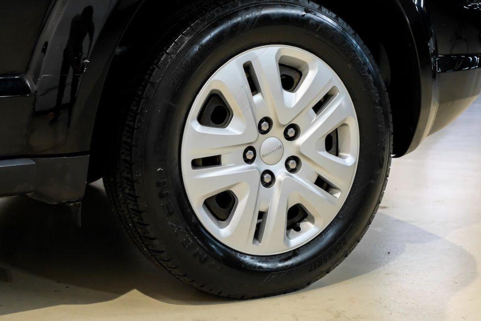 2017 Pitch Black Clearcoat /Black Dodge Journey SE (3C4PDCAB3HT) with an 2.4L I4 DOHC 16V Dual VVT engine, Automatic transmission, located at 15300 Midway Rd., Addison, TX, 75001, (972) 702-0011, 32.958321, -96.838074 - 2017 Dodge Journey SE<br><br>Now Available at Midway Auto Group, Addison, Texas<br><br>Practical, versatile, and budget-friendly, the 2017 Dodge Journey SE is a midsize SUV that delivers space, comfort, and value. With flexible seating, strong reliability, and a smooth driving feel, the Journey SE i - Photo#54