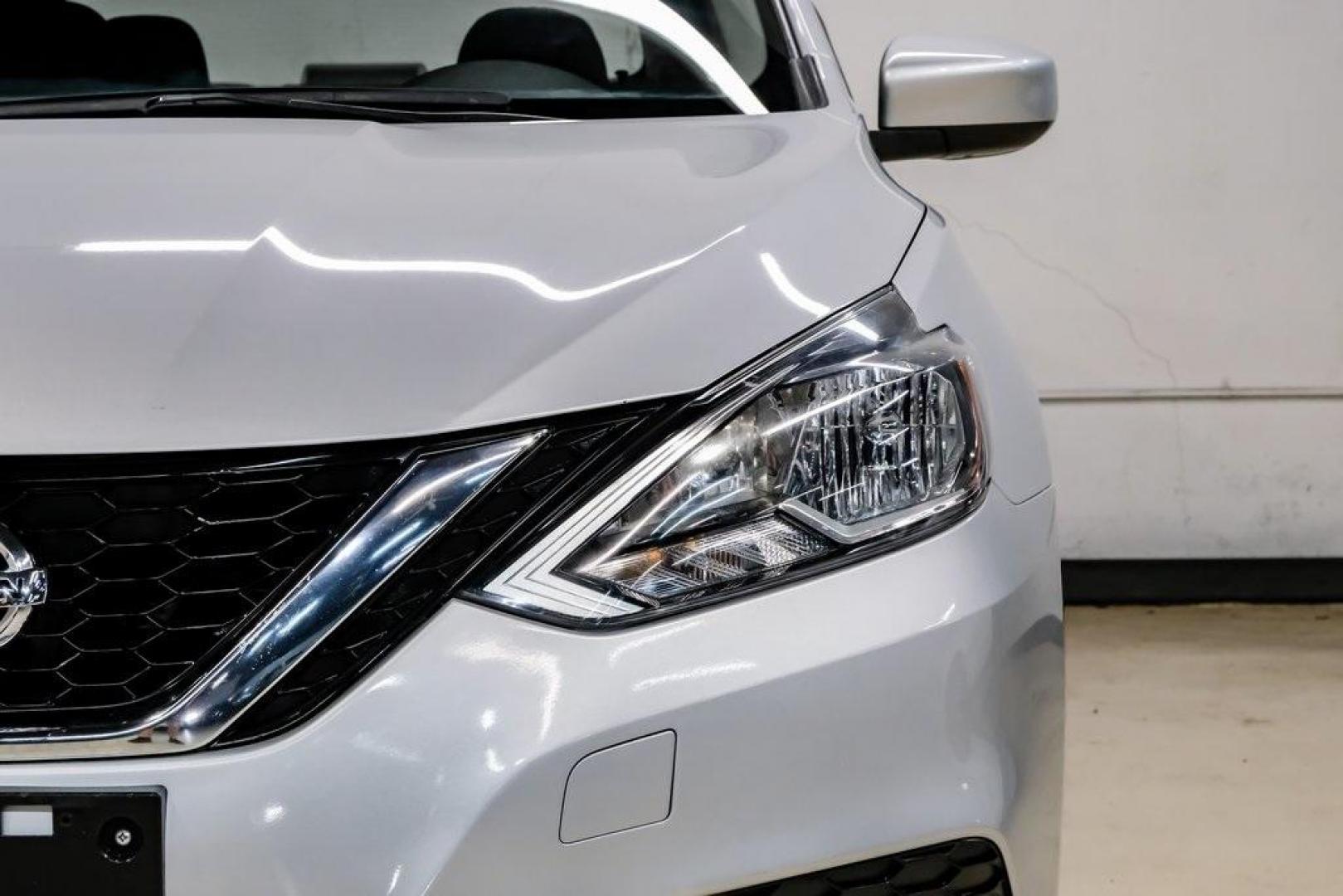 2019 Brilliant Silver Metallic /Charcoal Nissan Sentra SV (3N1AB7AP2KL) with an 1.8L 4-Cylinder DOHC 16V engine, CVT transmission, located at 15300 Midway Rd., Addison, TX, 75001, (972) 702-0011, 32.958321, -96.838074 - Photo#54