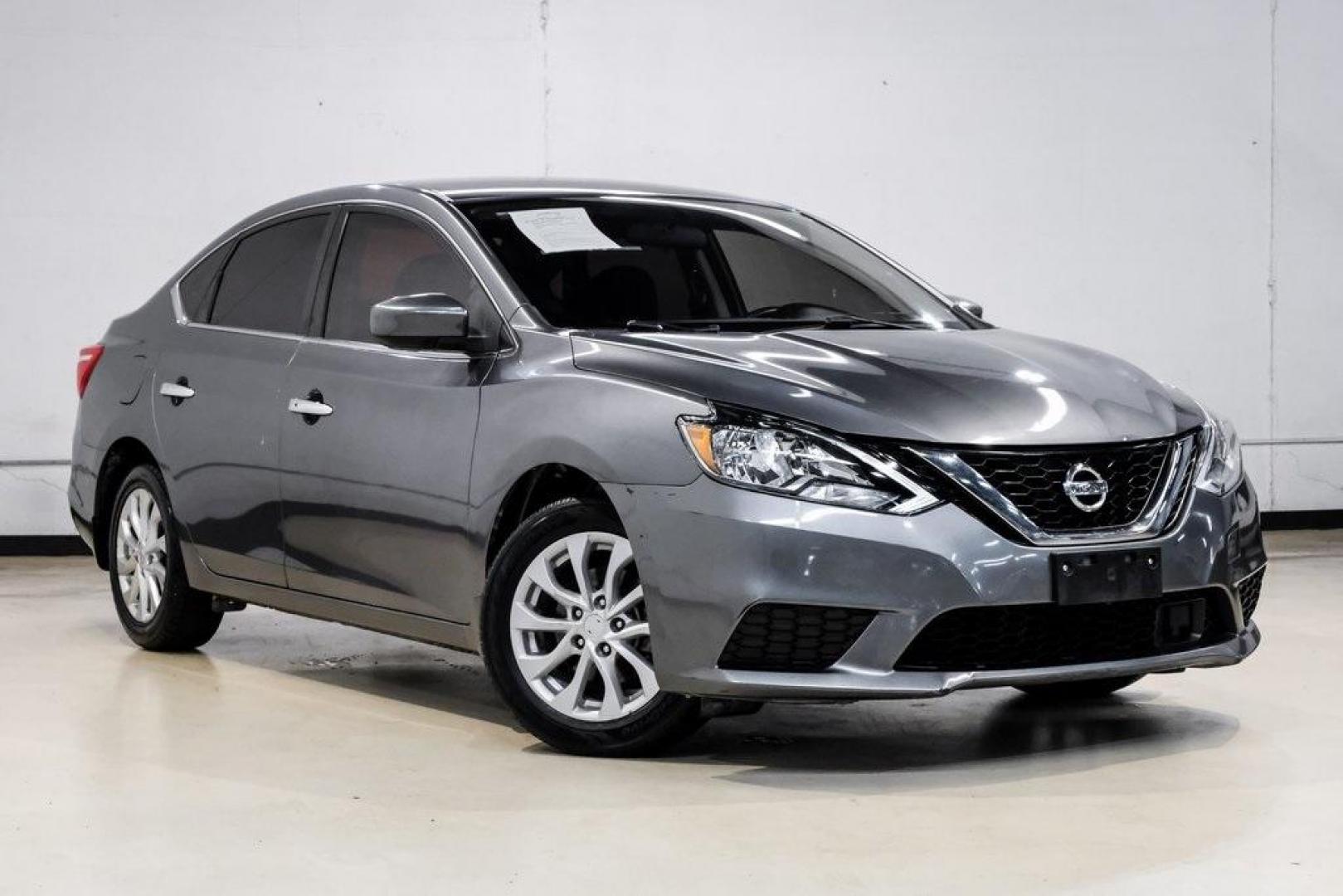 2019 Gun Metallic /Charcoal Nissan Sentra SV (3N1AB7AP4KL) with an 1.8L 4-Cylinder DOHC 16V engine, CVT transmission, located at 15300 Midway Rd., Addison, TX, 75001, (972) 702-0011, 32.958321, -96.838074 - 2019 Nissan Sentra SV<br><br>Now Available at Midway Auto Group, Addison, Texas<br><br>Comfortable, efficient, and packed with the 2019 Nissan Sentra SV is a step up from the base model, offering upgraded technology, refined interior features, and excellent fuel economy. With its spacious cabin and - Photo#7