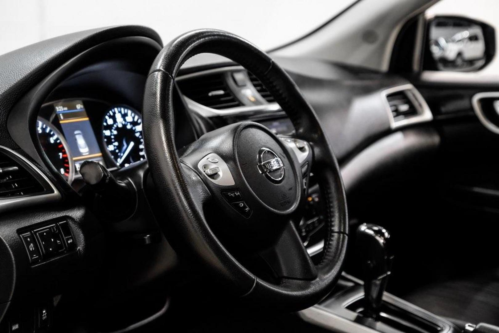 2019 Gun Metallic /Charcoal Nissan Sentra SV (3N1AB7AP4KL) with an 1.8L 4-Cylinder DOHC 16V engine, CVT transmission, located at 15300 Midway Rd., Addison, TX, 75001, (972) 702-0011, 32.958321, -96.838074 - 2019 Nissan Sentra SV<br><br>Now Available at Midway Auto Group, Addison, Texas<br><br>Comfortable, efficient, and packed with the 2019 Nissan Sentra SV is a step up from the base model, offering upgraded technology, refined interior features, and excellent fuel economy. With its spacious cabin and - Photo#24