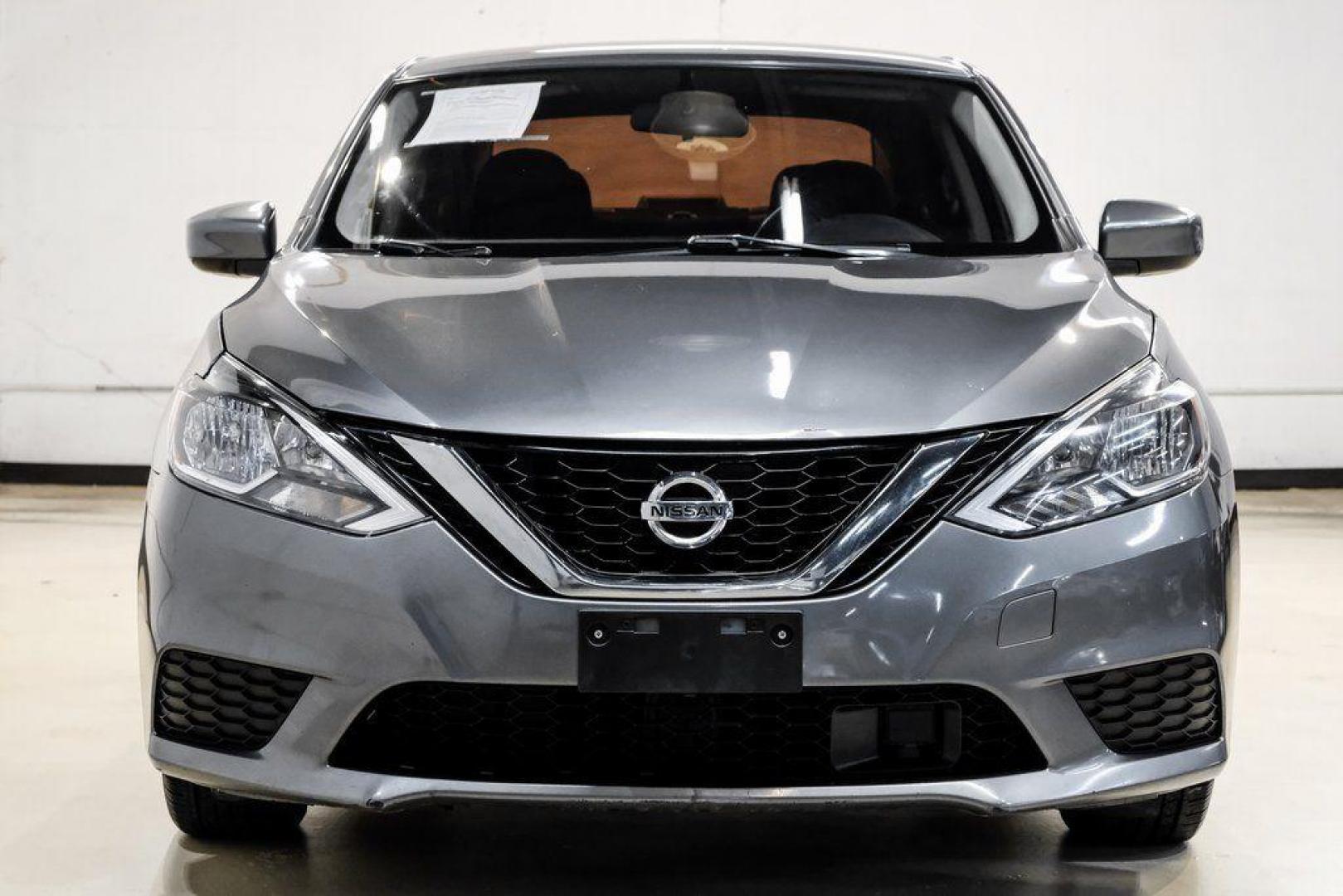 2019 Gun Metallic /Charcoal Nissan Sentra SV (3N1AB7AP4KL) with an 1.8L 4-Cylinder DOHC 16V engine, CVT transmission, located at 15300 Midway Rd., Addison, TX, 75001, (972) 702-0011, 32.958321, -96.838074 - 2019 Nissan Sentra SV<br><br>Now Available at Midway Auto Group, Addison, Texas<br><br>Comfortable, efficient, and packed with the 2019 Nissan Sentra SV is a step up from the base model, offering upgraded technology, refined interior features, and excellent fuel economy. With its spacious cabin and - Photo#6
