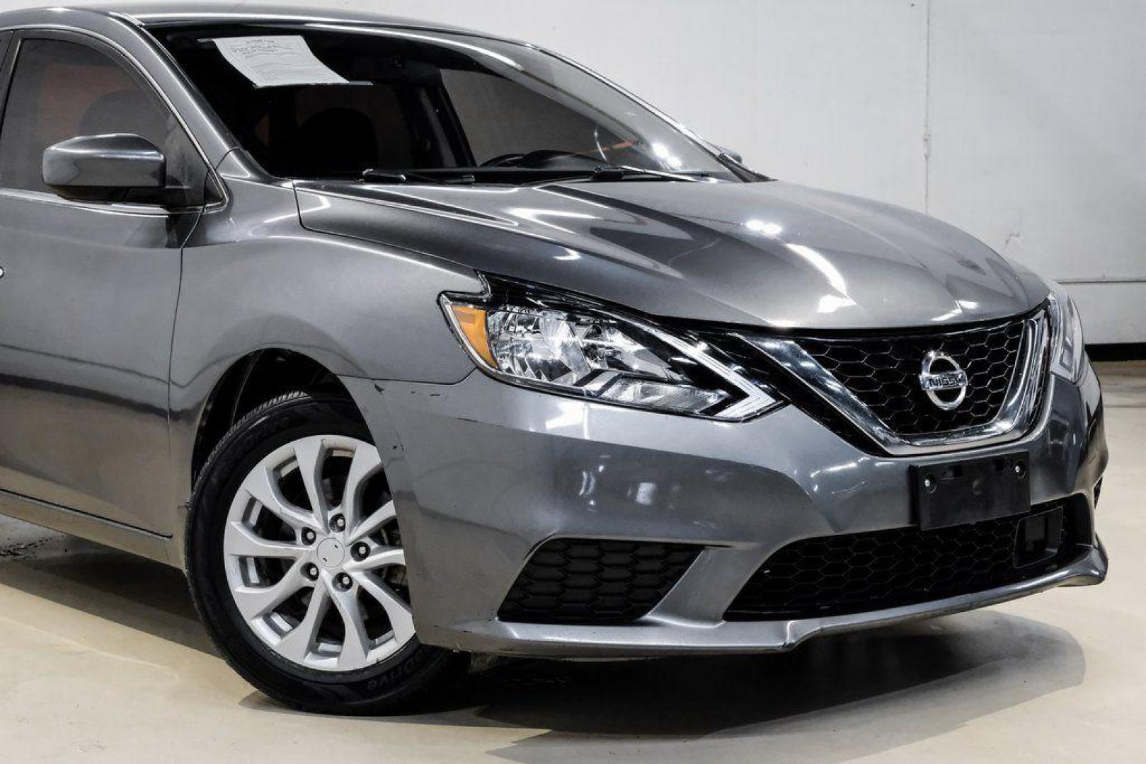 2019 Gun Metallic /Charcoal Nissan Sentra SV (3N1AB7AP4KL) with an 1.8L 4-Cylinder DOHC 16V engine, CVT transmission, located at 15300 Midway Rd., Addison, TX, 75001, (972) 702-0011, 32.958321, -96.838074 - 2019 Nissan Sentra SV<br><br>Now Available at Midway Auto Group, Addison, Texas<br><br>Comfortable, efficient, and packed with the 2019 Nissan Sentra SV is a step up from the base model, offering upgraded technology, refined interior features, and excellent fuel economy. With its spacious cabin and - Photo#9