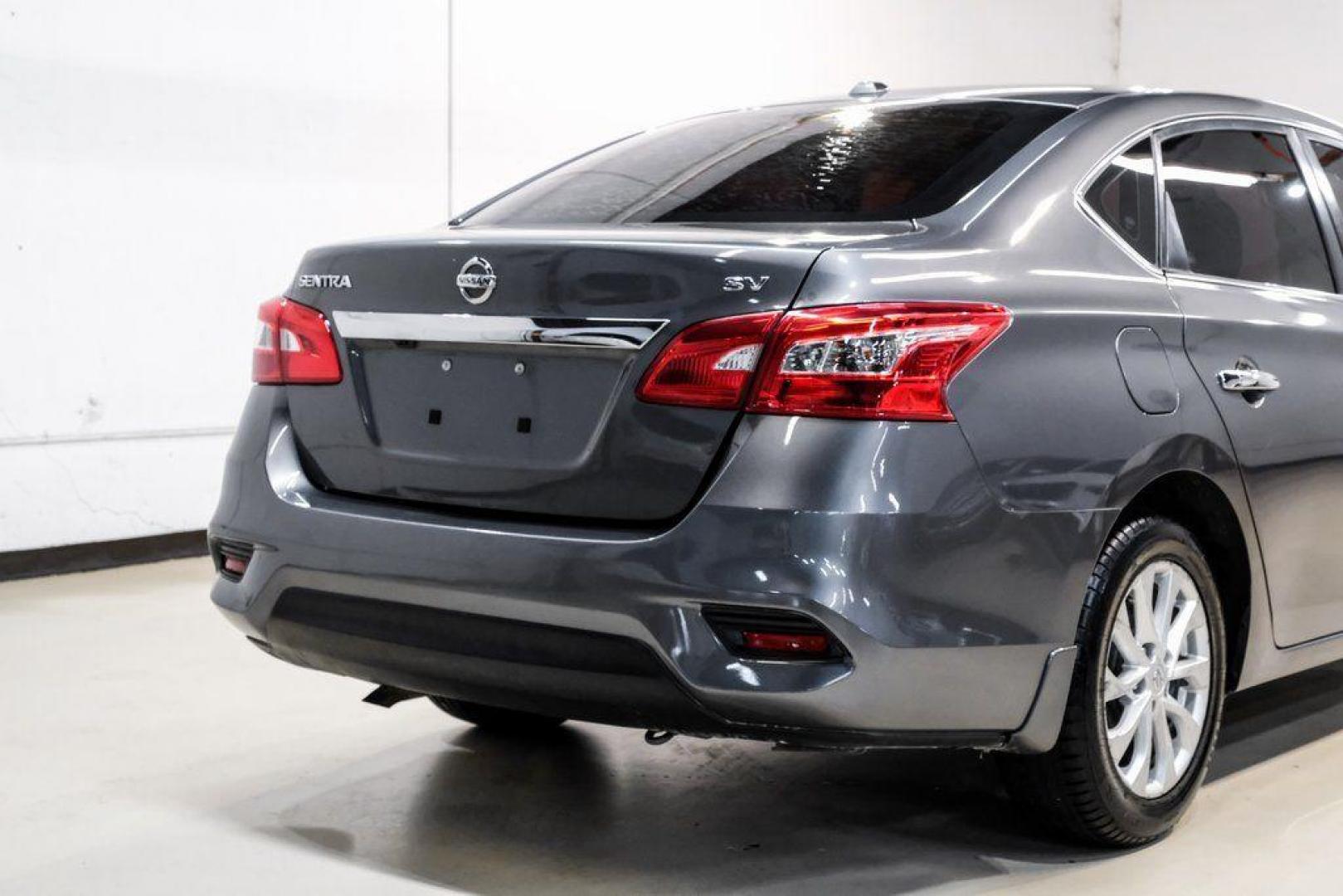 2019 Gun Metallic /Charcoal Nissan Sentra SV (3N1AB7AP4KL) with an 1.8L 4-Cylinder DOHC 16V engine, CVT transmission, located at 15300 Midway Rd., Addison, TX, 75001, (972) 702-0011, 32.958321, -96.838074 - 2019 Nissan Sentra SV<br><br>Now Available at Midway Auto Group, Addison, Texas<br><br>Comfortable, efficient, and packed with the 2019 Nissan Sentra SV is a step up from the base model, offering upgraded technology, refined interior features, and excellent fuel economy. With its spacious cabin and - Photo#12