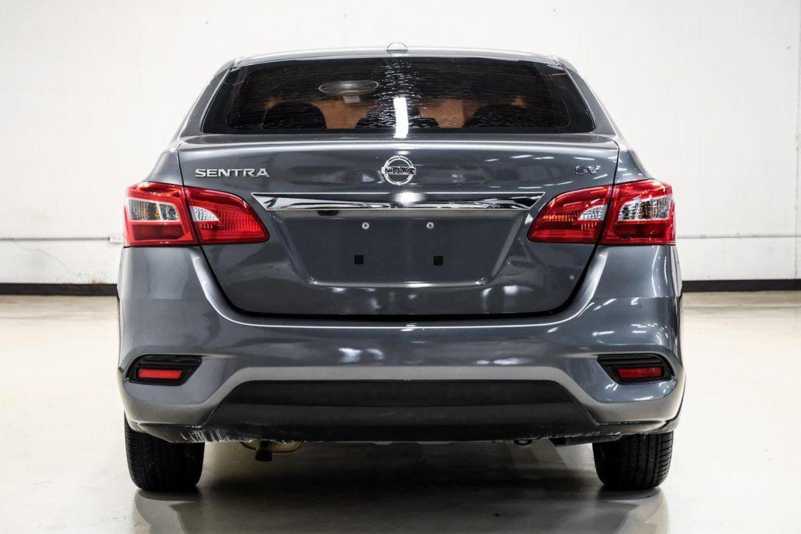 2019 Gun Metallic /Charcoal Nissan Sentra SV (3N1AB7AP4KL) with an 1.8L 4-Cylinder DOHC 16V engine, CVT transmission, located at 15300 Midway Rd., Addison, TX, 75001, (972) 702-0011, 32.958321, -96.838074 - 2019 Nissan Sentra SV<br><br>Now Available at Midway Auto Group, Addison, Texas<br><br>Comfortable, efficient, and packed with the 2019 Nissan Sentra SV is a step up from the base model, offering upgraded technology, refined interior features, and excellent fuel economy. With its spacious cabin and - Photo#14