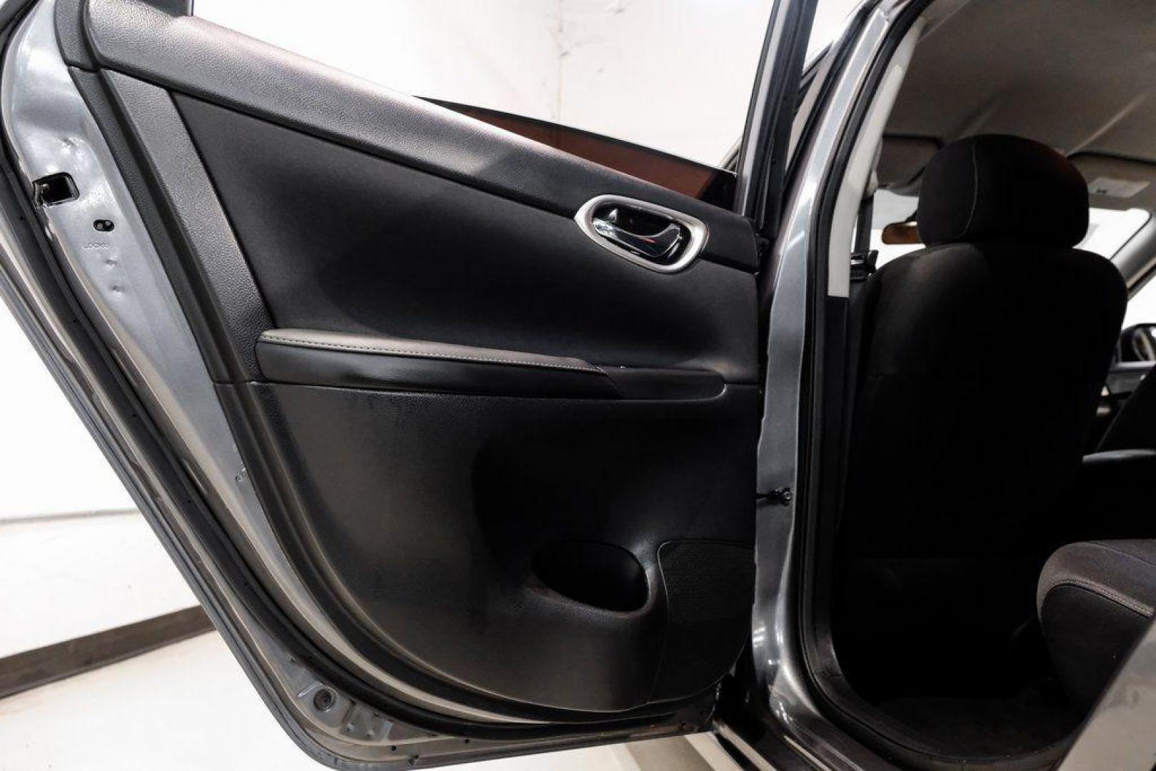 2019 Gun Metallic /Charcoal Nissan Sentra SV (3N1AB7AP4KL) with an 1.8L 4-Cylinder DOHC 16V engine, CVT transmission, located at 15300 Midway Rd., Addison, TX, 75001, (972) 702-0011, 32.958321, -96.838074 - 2019 Nissan Sentra SV<br><br>Now Available at Midway Auto Group, Addison, Texas<br><br>Comfortable, efficient, and packed with the 2019 Nissan Sentra SV is a step up from the base model, offering upgraded technology, refined interior features, and excellent fuel economy. With its spacious cabin and - Photo#53