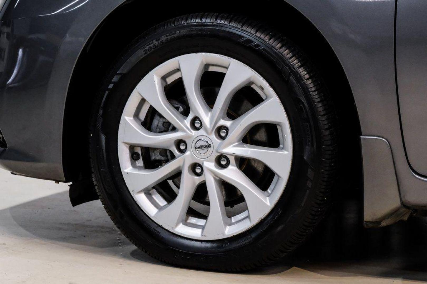 2019 Gun Metallic /Charcoal Nissan Sentra SV (3N1AB7AP4KL) with an 1.8L 4-Cylinder DOHC 16V engine, CVT transmission, located at 15300 Midway Rd., Addison, TX, 75001, (972) 702-0011, 32.958321, -96.838074 - 2019 Nissan Sentra SV<br><br>Now Available at Midway Auto Group, Addison, Texas<br><br>Comfortable, efficient, and packed with the 2019 Nissan Sentra SV is a step up from the base model, offering upgraded technology, refined interior features, and excellent fuel economy. With its spacious cabin and - Photo#64