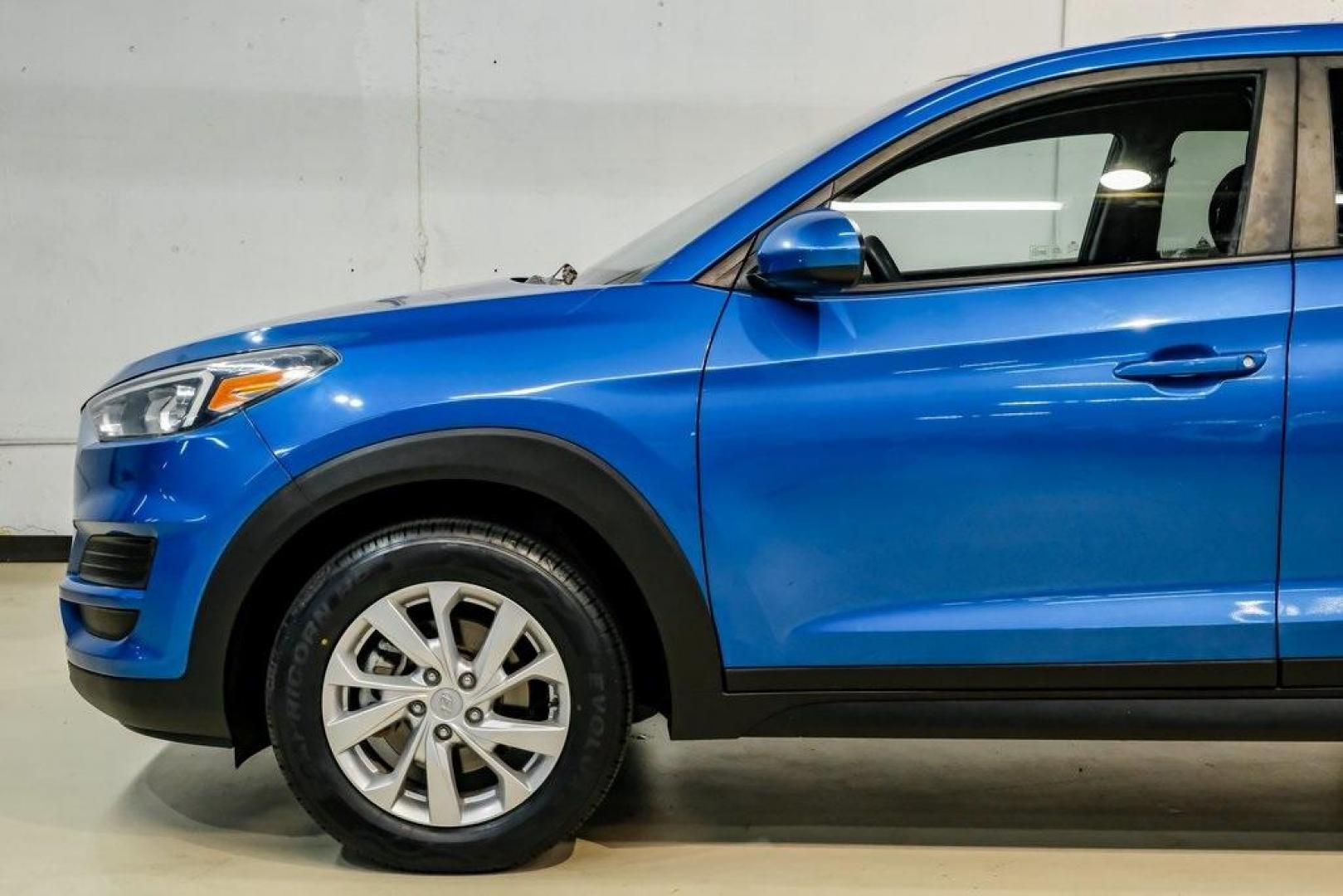 2019 Aqua Blue /Black Hyundai Tucson SE (KM8J2CA43KU) with an I4 engine, Automatic transmission, located at 15300 Midway Rd., Addison, TX, 75001, (972) 702-0011, 32.958321, -96.838074 - Photo#15