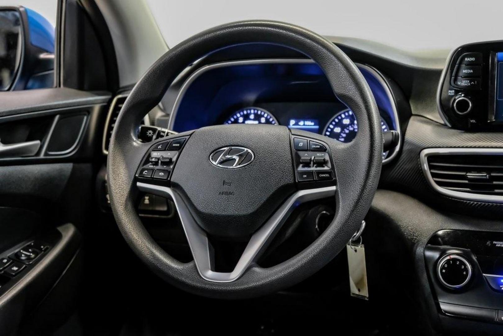 2019 Aqua Blue /Black Hyundai Tucson SE (KM8J2CA43KU) with an I4 engine, Automatic transmission, located at 15300 Midway Rd., Addison, TX, 75001, (972) 702-0011, 32.958321, -96.838074 - Photo#21