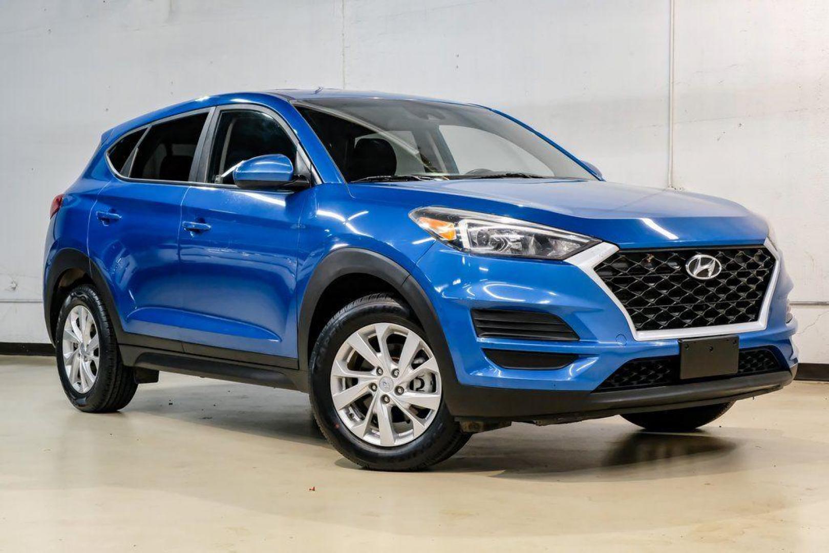 2019 Aqua Blue /Black Hyundai Tucson SE (KM8J2CA43KU) with an I4 engine, Automatic transmission, located at 15300 Midway Rd., Addison, TX, 75001, (972) 702-0011, 32.958321, -96.838074 - Photo#7