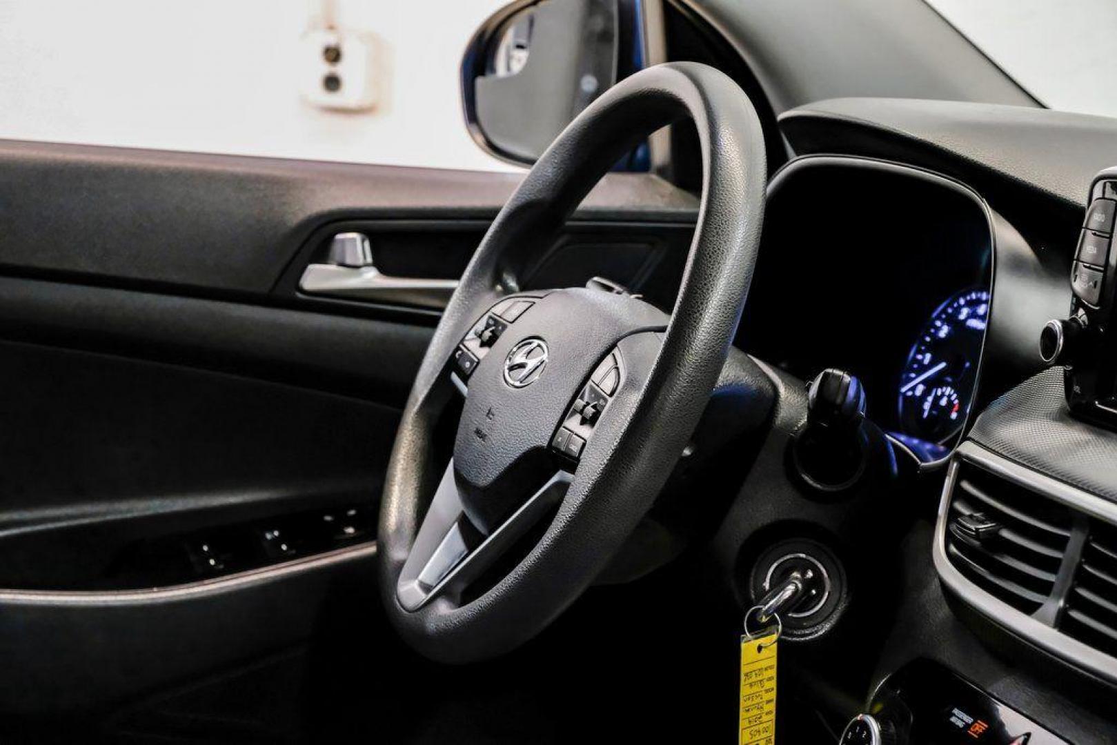 2019 Aqua Blue /Black Hyundai Tucson SE (KM8J2CA43KU) with an I4 engine, Automatic transmission, located at 15300 Midway Rd., Addison, TX, 75001, (972) 702-0011, 32.958321, -96.838074 - Photo#18