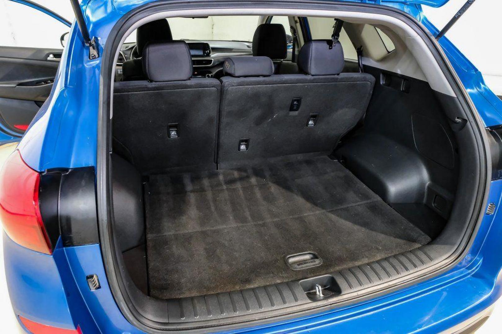 2019 Aqua Blue /Black Hyundai Tucson SE (KM8J2CA43KU) with an I4 engine, Automatic transmission, located at 15300 Midway Rd., Addison, TX, 75001, (972) 702-0011, 32.958321, -96.838074 - Photo#57