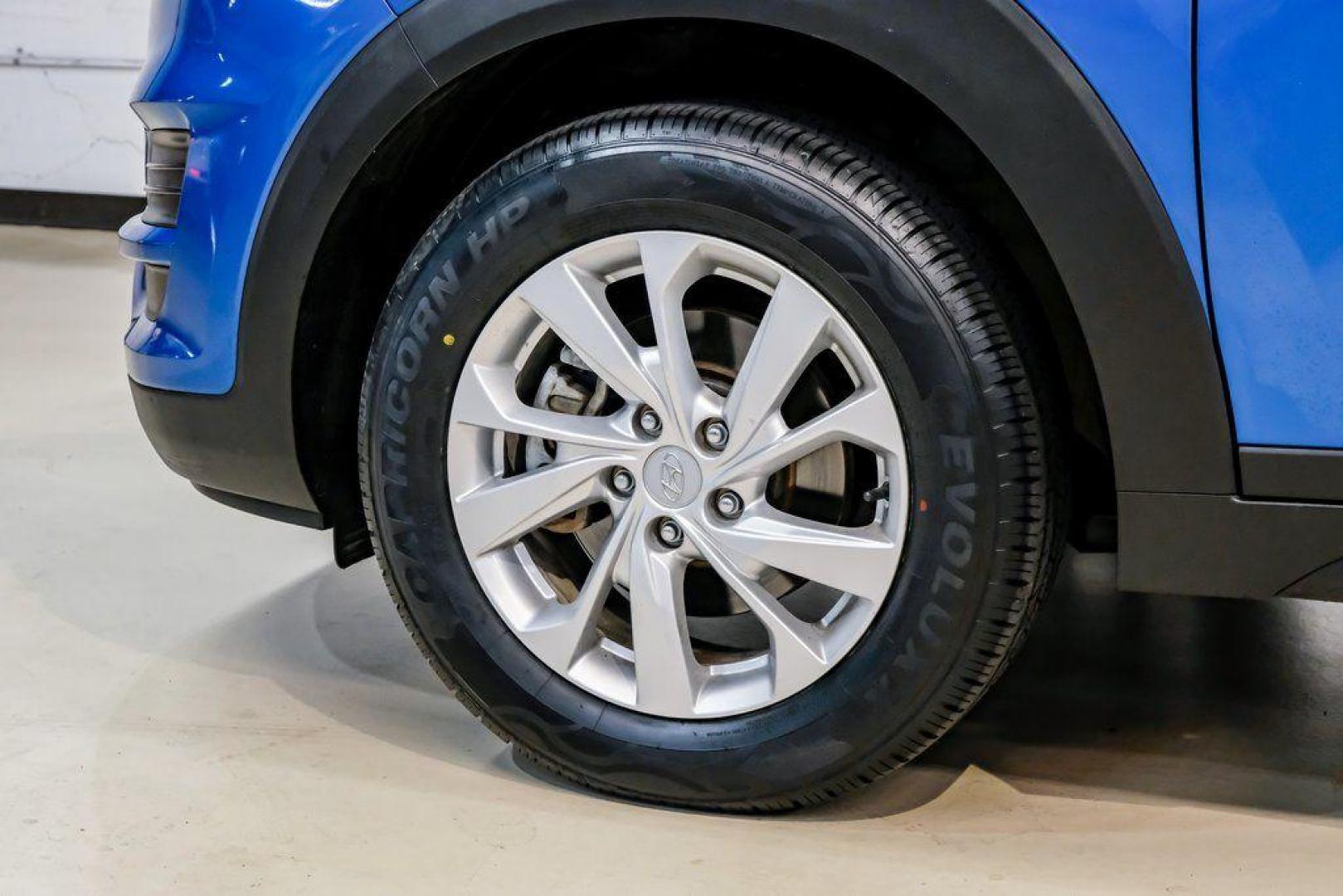 2019 Aqua Blue /Black Hyundai Tucson SE (KM8J2CA43KU) with an I4 engine, Automatic transmission, located at 15300 Midway Rd., Addison, TX, 75001, (972) 702-0011, 32.958321, -96.838074 - Photo#60