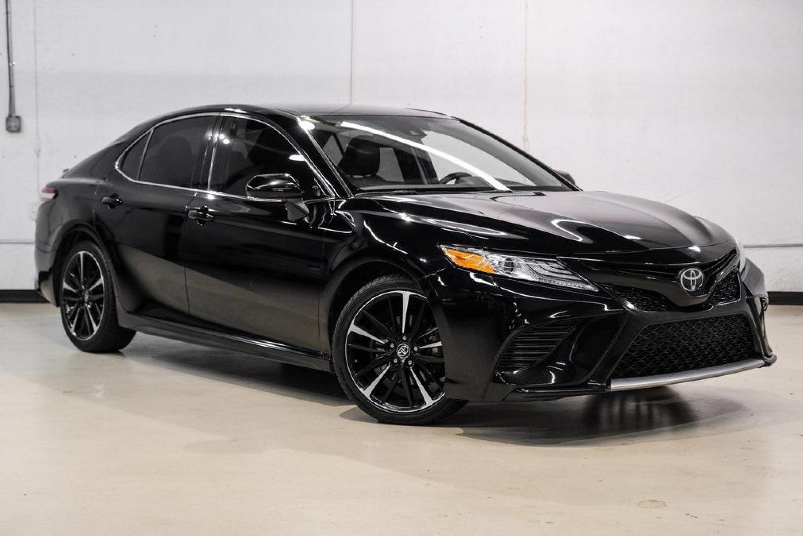 2020 Midnight Black Metallic /Black Toyota Camry XSE (4T1K61AK0LU) with an 2.5L I4 DOHC 16V engine, Automatic transmission, located at 15300 Midway Rd., Addison, TX, 75001, (972) 702-0011, 32.958321, -96.838074 - HOME OF THE NO HAGGLE PRICE - WHOLESALE PRICES TO THE PUBLIC!! Camry XSE, 4D Sedan, 2.5L I4 DOHC 16V, 8-Speed Automatic, FWD, Midnight Black, Black Leather. Priced below KBB Fair Purchase Price!<br><br>Midnight Black 2020 Toyota Camry XSE<br><br>27/38 City/Highway MPG<br><br><br>At Midway Auto Group - Photo#5