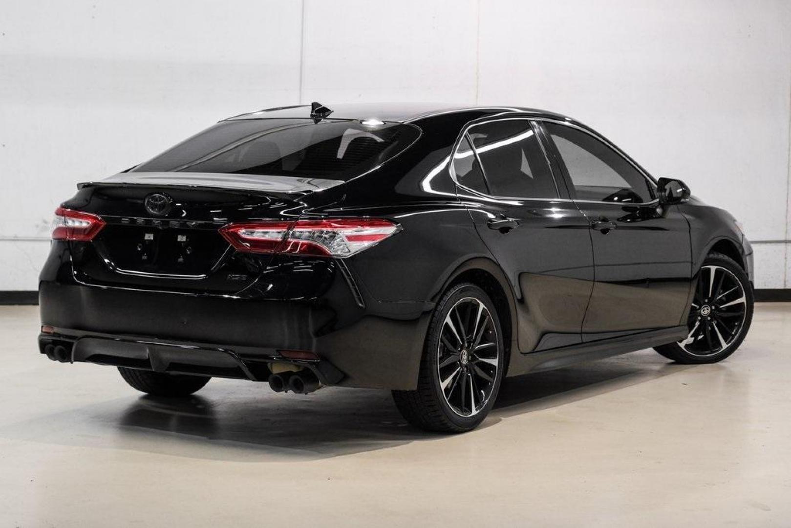 2020 Midnight Black Metallic /Black Toyota Camry XSE (4T1K61AK0LU) with an 2.5L I4 DOHC 16V engine, Automatic transmission, located at 15300 Midway Rd., Addison, TX, 75001, (972) 702-0011, 32.958321, -96.838074 - HOME OF THE NO HAGGLE PRICE - WHOLESALE PRICES TO THE PUBLIC!! Camry XSE, 4D Sedan, 2.5L I4 DOHC 16V, 8-Speed Automatic, FWD, Midnight Black, Black Leather. Priced below KBB Fair Purchase Price!<br><br>Midnight Black 2020 Toyota Camry XSE<br><br>27/38 City/Highway MPG<br><br><br>At Midway Auto Group - Photo#7