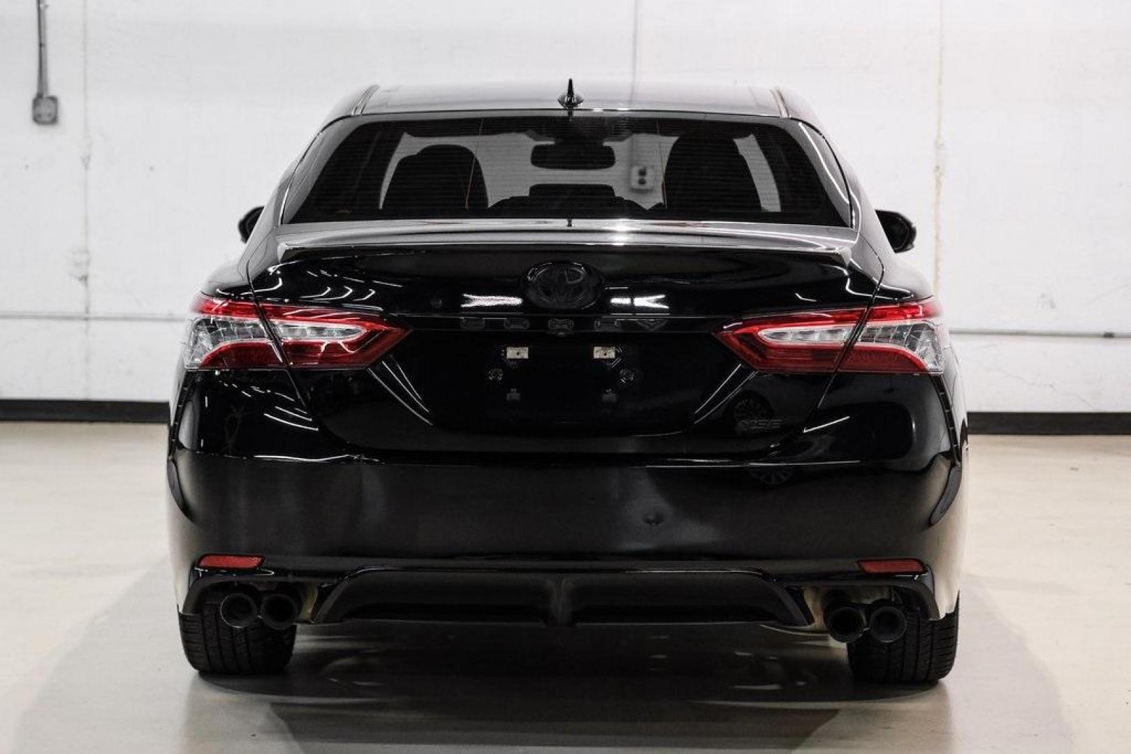 2020 Midnight Black Metallic /Black Toyota Camry XSE (4T1K61AK0LU) with an 2.5L I4 DOHC 16V engine, Automatic transmission, located at 15300 Midway Rd., Addison, TX, 75001, (972) 702-0011, 32.958321, -96.838074 - HOME OF THE NO HAGGLE PRICE - WHOLESALE PRICES TO THE PUBLIC!! Camry XSE, 4D Sedan, 2.5L I4 DOHC 16V, 8-Speed Automatic, FWD, Midnight Black, Black Leather. Priced below KBB Fair Purchase Price!<br><br>Midnight Black 2020 Toyota Camry XSE<br><br>27/38 City/Highway MPG<br><br><br>At Midway Auto Group - Photo#8