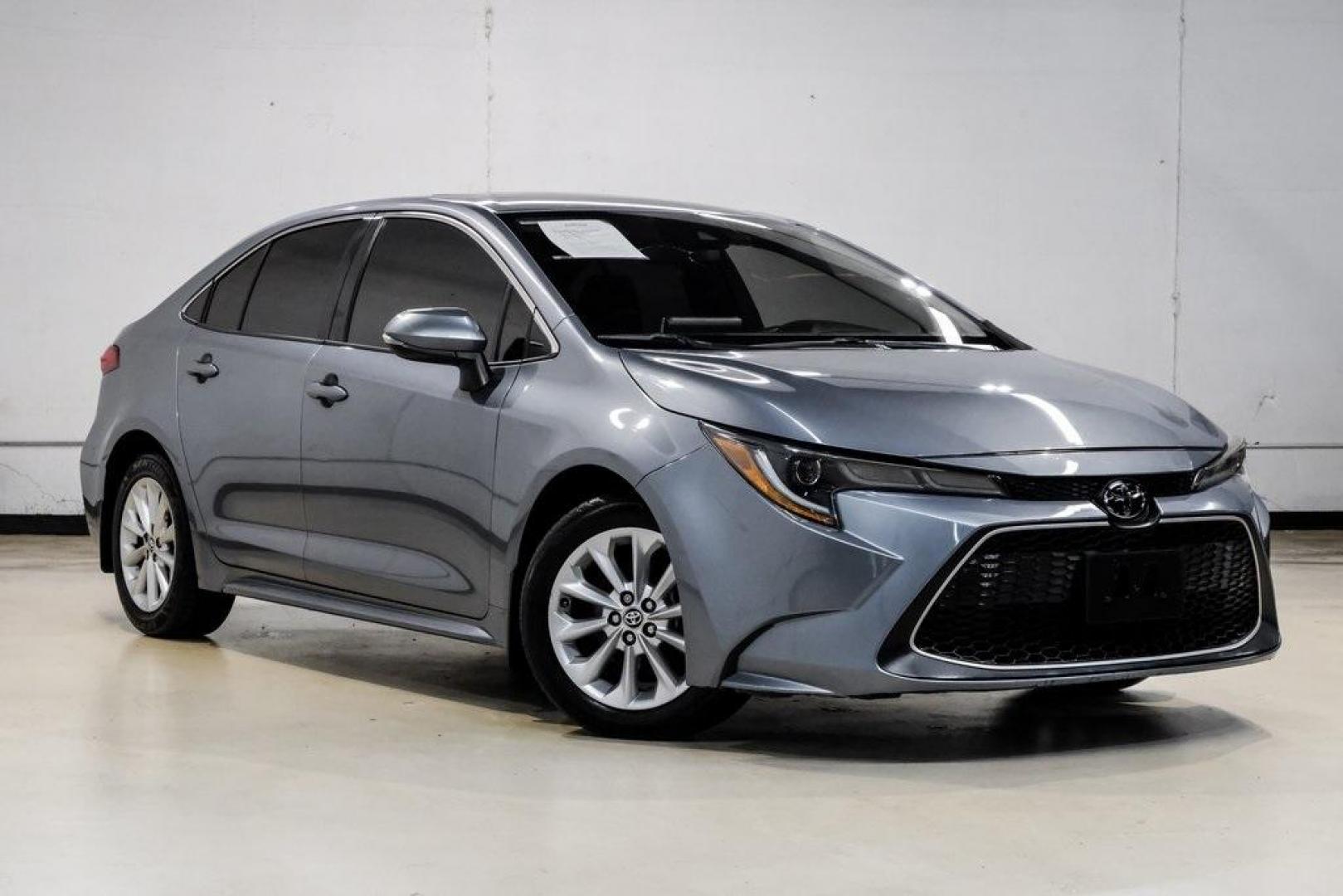 2020 Classic Silver Metallic /Black Toyota Corolla XLE (JTDFPRAE5LJ) with an 1.8L I4 DOHC 16V engine, CVT transmission, located at 15300 Midway Rd., Addison, TX, 75001, (972) 702-0011, 32.958321, -96.838074 - 2020 Toyota Corolla XLE<br><br>Now Available at Midway Auto Group, Addison, Texas<br><br>Comfort-focused, refined, and built with Toyotas unmatched reputation for reliabilitythe 2020 Toyota Corolla XLE offers an upscale driving experience with premium interior materials, advanced safety technology, - Photo#8