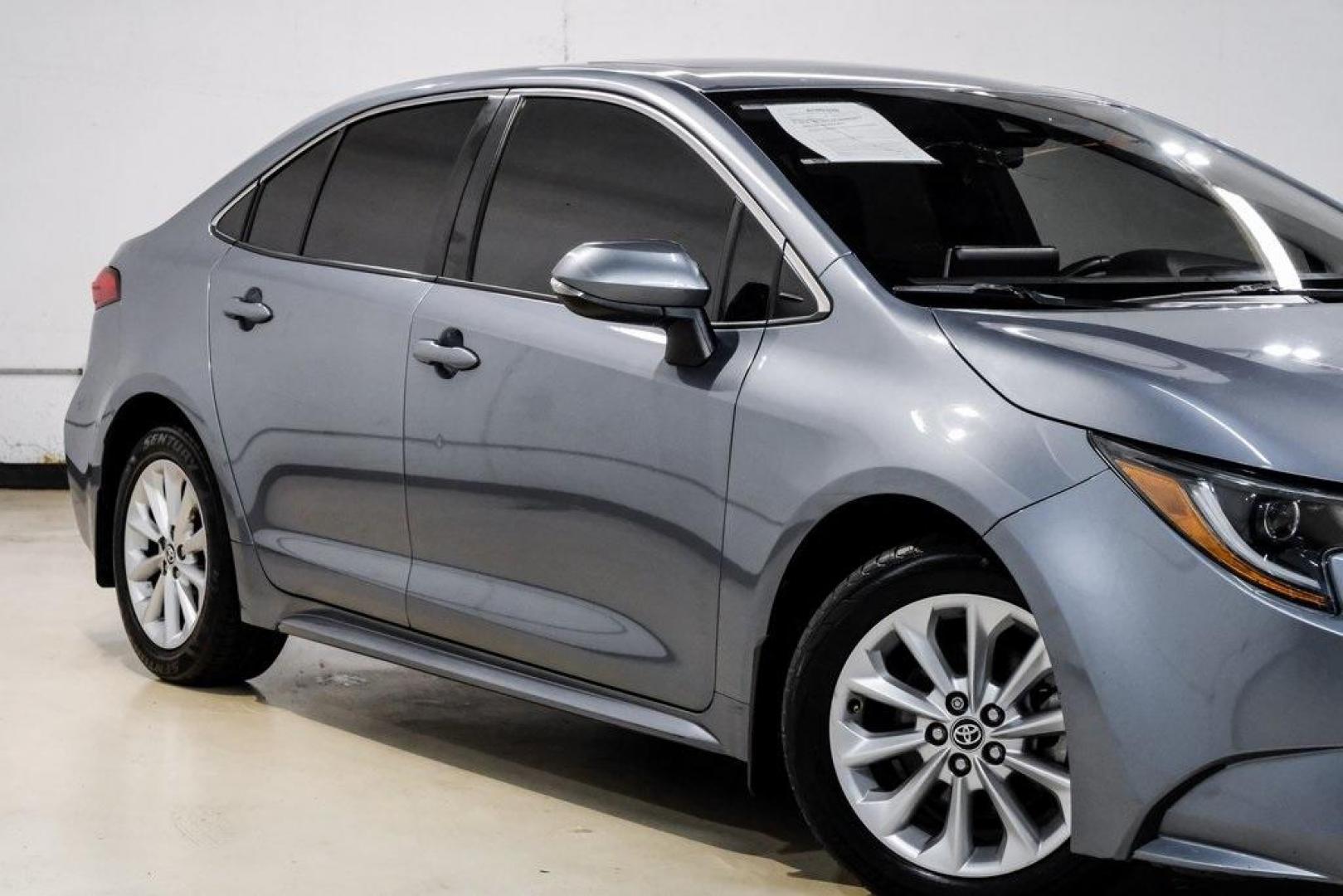 2020 Classic Silver Metallic /Black Toyota Corolla XLE (JTDFPRAE5LJ) with an 1.8L I4 DOHC 16V engine, CVT transmission, located at 15300 Midway Rd., Addison, TX, 75001, (972) 702-0011, 32.958321, -96.838074 - 2020 Toyota Corolla XLE<br><br>Now Available at Midway Auto Group, Addison, Texas<br><br>Comfort-focused, refined, and built with Toyotas unmatched reputation for reliabilitythe 2020 Toyota Corolla XLE offers an upscale driving experience with premium interior materials, advanced safety technology, - Photo#9