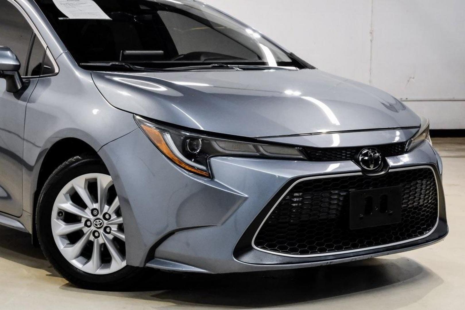 2020 Classic Silver Metallic /Black Toyota Corolla XLE (JTDFPRAE5LJ) with an 1.8L I4 DOHC 16V engine, CVT transmission, located at 15300 Midway Rd., Addison, TX, 75001, (972) 702-0011, 32.958321, -96.838074 - 2020 Toyota Corolla XLE<br><br>Now Available at Midway Auto Group, Addison, Texas<br><br>Comfort-focused, refined, and built with Toyotas unmatched reputation for reliabilitythe 2020 Toyota Corolla XLE offers an upscale driving experience with premium interior materials, advanced safety technology, - Photo#10