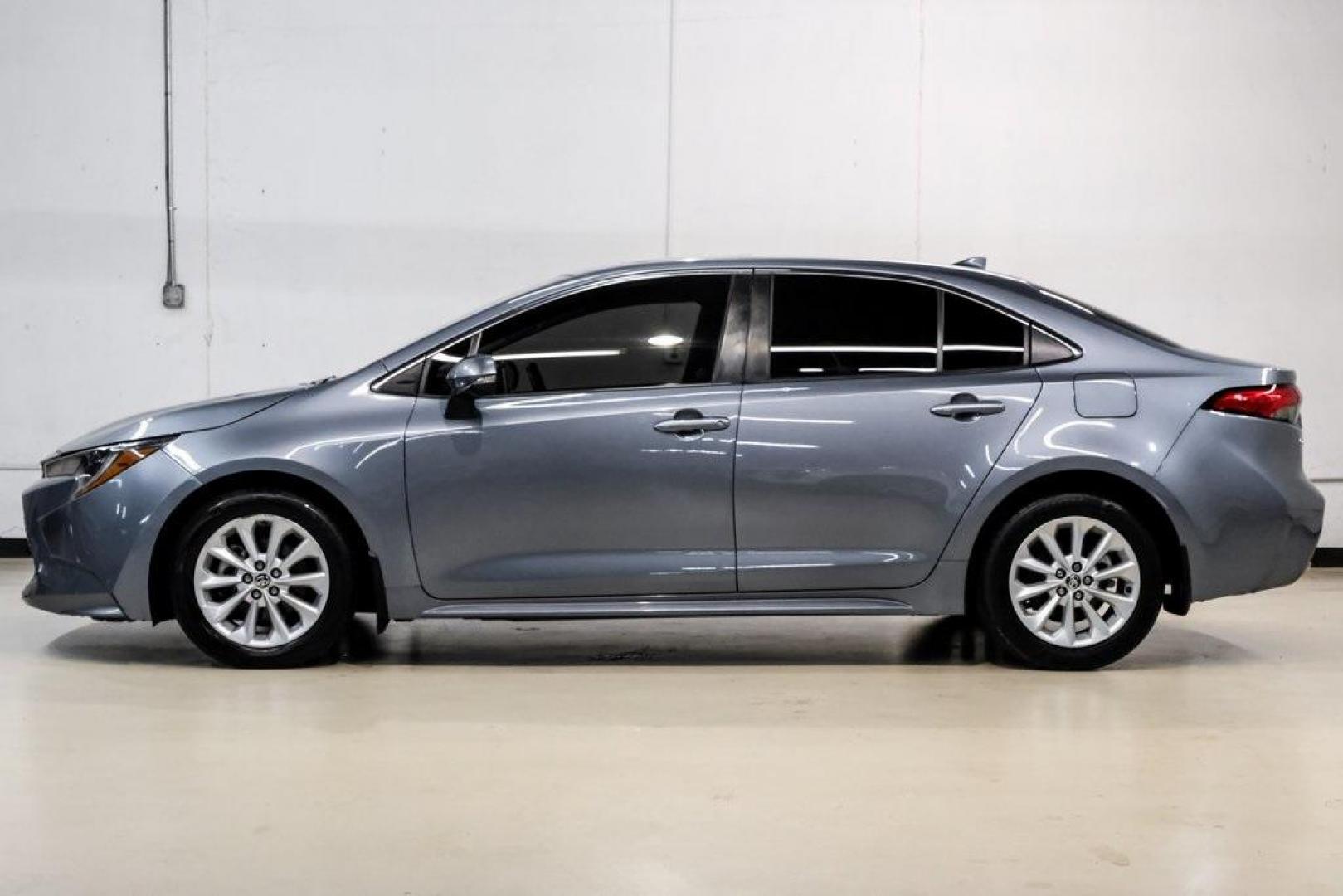2020 Classic Silver Metallic /Black Toyota Corolla XLE (JTDFPRAE5LJ) with an 1.8L I4 DOHC 16V engine, CVT transmission, located at 15300 Midway Rd., Addison, TX, 75001, (972) 702-0011, 32.958321, -96.838074 - 2020 Toyota Corolla XLE<br><br>Now Available at Midway Auto Group, Addison, Texas<br><br>Comfort-focused, refined, and built with Toyotas unmatched reputation for reliabilitythe 2020 Toyota Corolla XLE offers an upscale driving experience with premium interior materials, advanced safety technology, - Photo#18