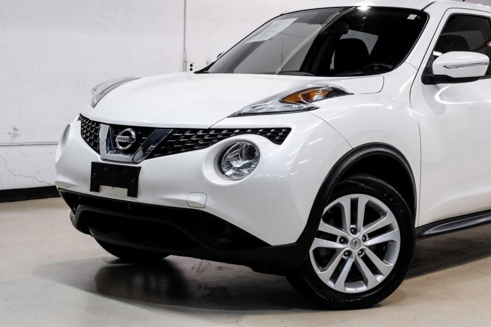2016 White Pearl /Black Nissan Juke S (JN8AF5MV3GT) with an 1.6L I4 DOHC 16V engine, CVT transmission, located at 15300 Midway Rd., Addison, TX, 75001, (972) 702-0011, 32.958321, -96.838074 - 2016 Nissan Juke S AWD<br><br>Now Available at Midway Auto Group, Addison, Texas<br><br>Bold, compact, and fun to drive 2016 Nissan Juke S AWD delivers turbocharged performance, eye-catching styling, and the confidence of all-wheel drive. Perfect for city driving, tight parking, and daily commuting - Photo#4