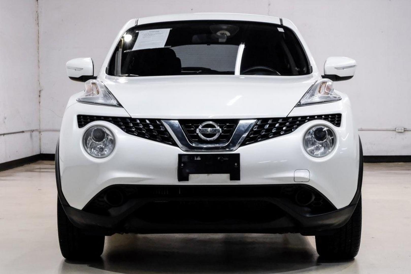 2016 White Pearl /Black Nissan Juke S (JN8AF5MV3GT) with an 1.6L I4 DOHC 16V engine, CVT transmission, located at 15300 Midway Rd., Addison, TX, 75001, (972) 702-0011, 32.958321, -96.838074 - 2016 Nissan Juke S AWD<br><br>Now Available at Midway Auto Group, Addison, Texas<br><br>Bold, compact, and fun to drive 2016 Nissan Juke S AWD delivers turbocharged performance, eye-catching styling, and the confidence of all-wheel drive. Perfect for city driving, tight parking, and daily commuting - Photo#6