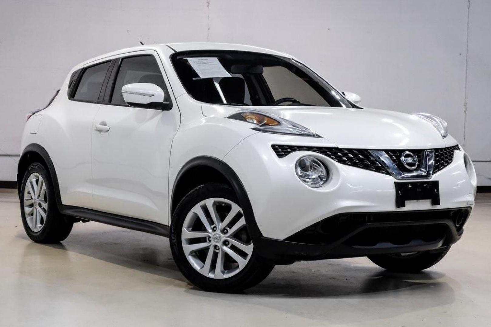 2016 White Pearl /Black Nissan Juke S (JN8AF5MV3GT) with an 1.6L I4 DOHC 16V engine, CVT transmission, located at 15300 Midway Rd., Addison, TX, 75001, (972) 702-0011, 32.958321, -96.838074 - 2016 Nissan Juke S AWD<br><br>Now Available at Midway Auto Group, Addison, Texas<br><br>Bold, compact, and fun to drive 2016 Nissan Juke S AWD delivers turbocharged performance, eye-catching styling, and the confidence of all-wheel drive. Perfect for city driving, tight parking, and daily commuting - Photo#7