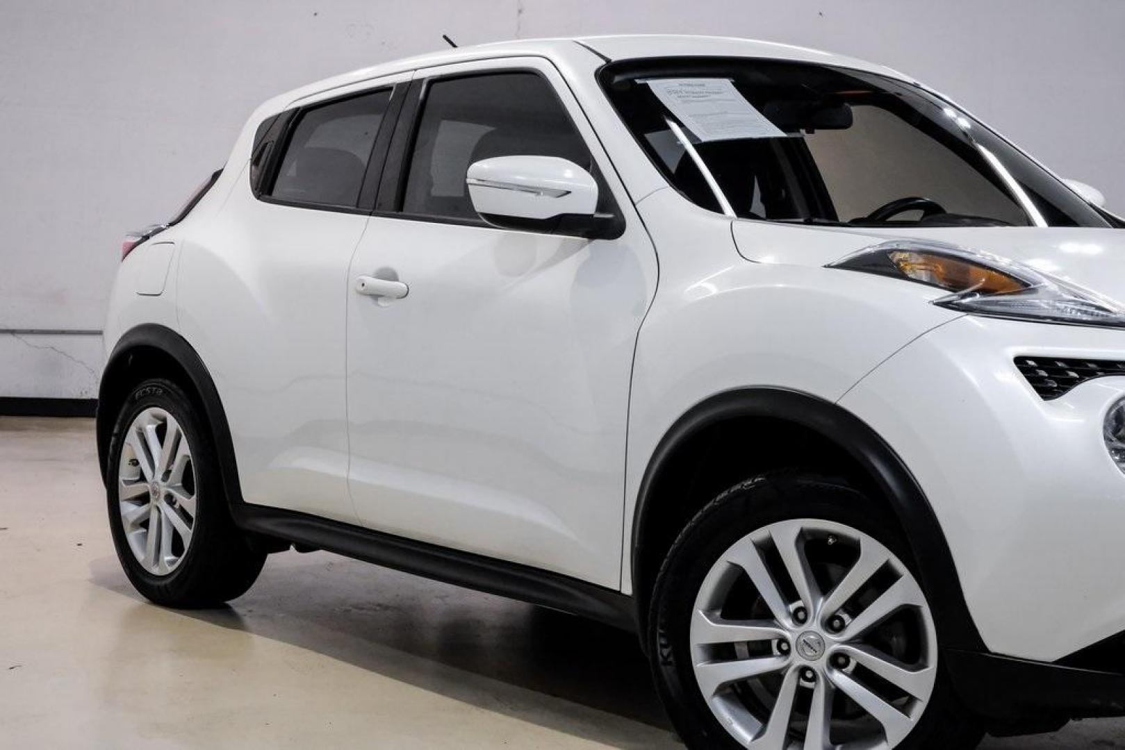 2016 White Pearl /Black Nissan Juke S (JN8AF5MV3GT) with an 1.6L I4 DOHC 16V engine, CVT transmission, located at 15300 Midway Rd., Addison, TX, 75001, (972) 702-0011, 32.958321, -96.838074 - 2016 Nissan Juke S AWD<br><br>Now Available at Midway Auto Group, Addison, Texas<br><br>Bold, compact, and fun to drive 2016 Nissan Juke S AWD delivers turbocharged performance, eye-catching styling, and the confidence of all-wheel drive. Perfect for city driving, tight parking, and daily commuting - Photo#8