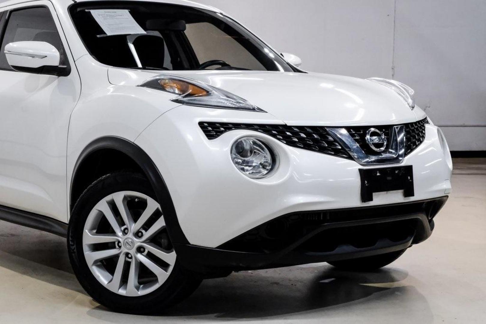 2016 White Pearl /Black Nissan Juke S (JN8AF5MV3GT) with an 1.6L I4 DOHC 16V engine, CVT transmission, located at 15300 Midway Rd., Addison, TX, 75001, (972) 702-0011, 32.958321, -96.838074 - 2016 Nissan Juke S AWD<br><br>Now Available at Midway Auto Group, Addison, Texas<br><br>Bold, compact, and fun to drive 2016 Nissan Juke S AWD delivers turbocharged performance, eye-catching styling, and the confidence of all-wheel drive. Perfect for city driving, tight parking, and daily commuting - Photo#9