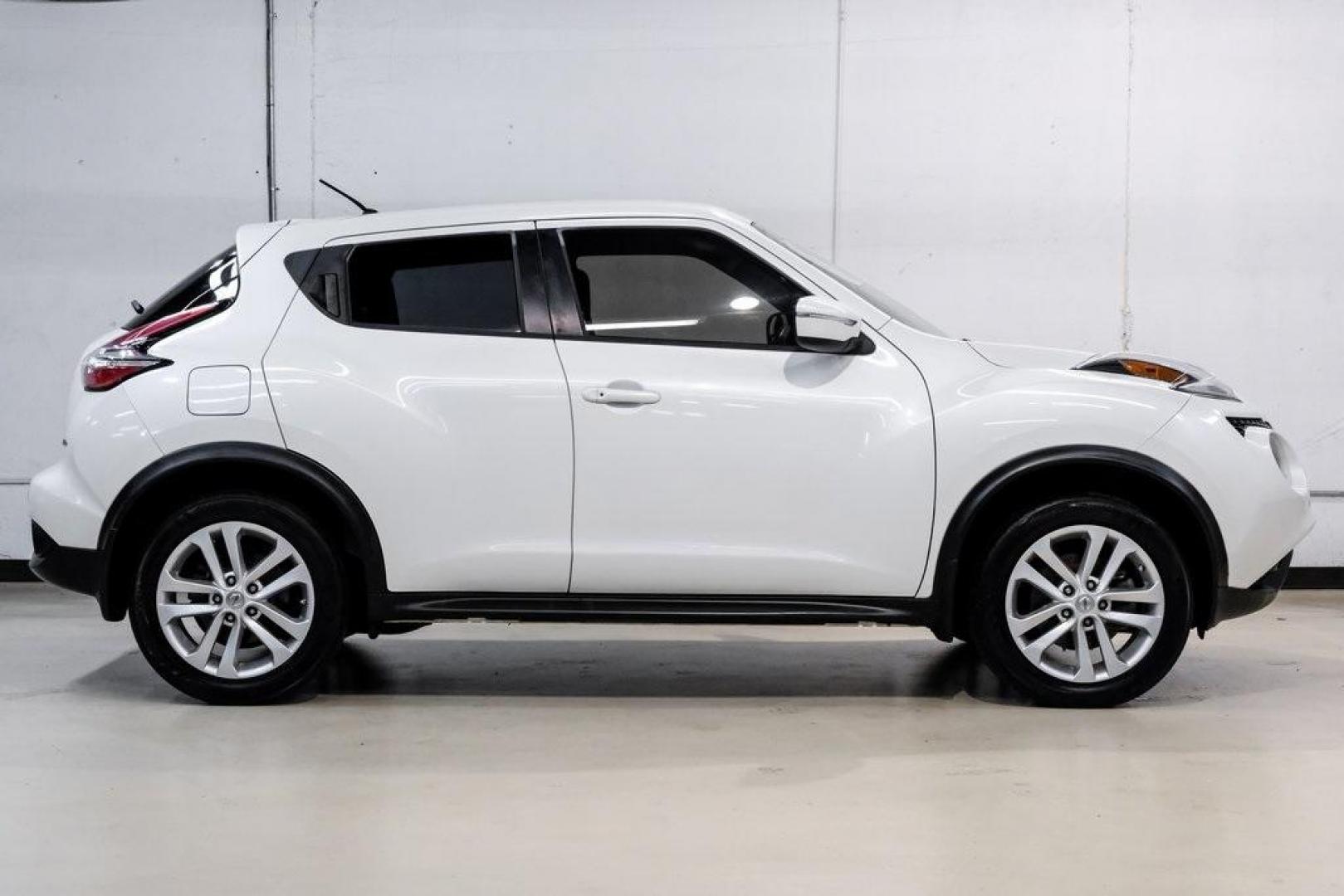 2016 White Pearl /Black Nissan Juke S (JN8AF5MV3GT) with an 1.6L I4 DOHC 16V engine, CVT transmission, located at 15300 Midway Rd., Addison, TX, 75001, (972) 702-0011, 32.958321, -96.838074 - 2016 Nissan Juke S AWD<br><br>Now Available at Midway Auto Group, Addison, Texas<br><br>Bold, compact, and fun to drive 2016 Nissan Juke S AWD delivers turbocharged performance, eye-catching styling, and the confidence of all-wheel drive. Perfect for city driving, tight parking, and daily commuting - Photo#10