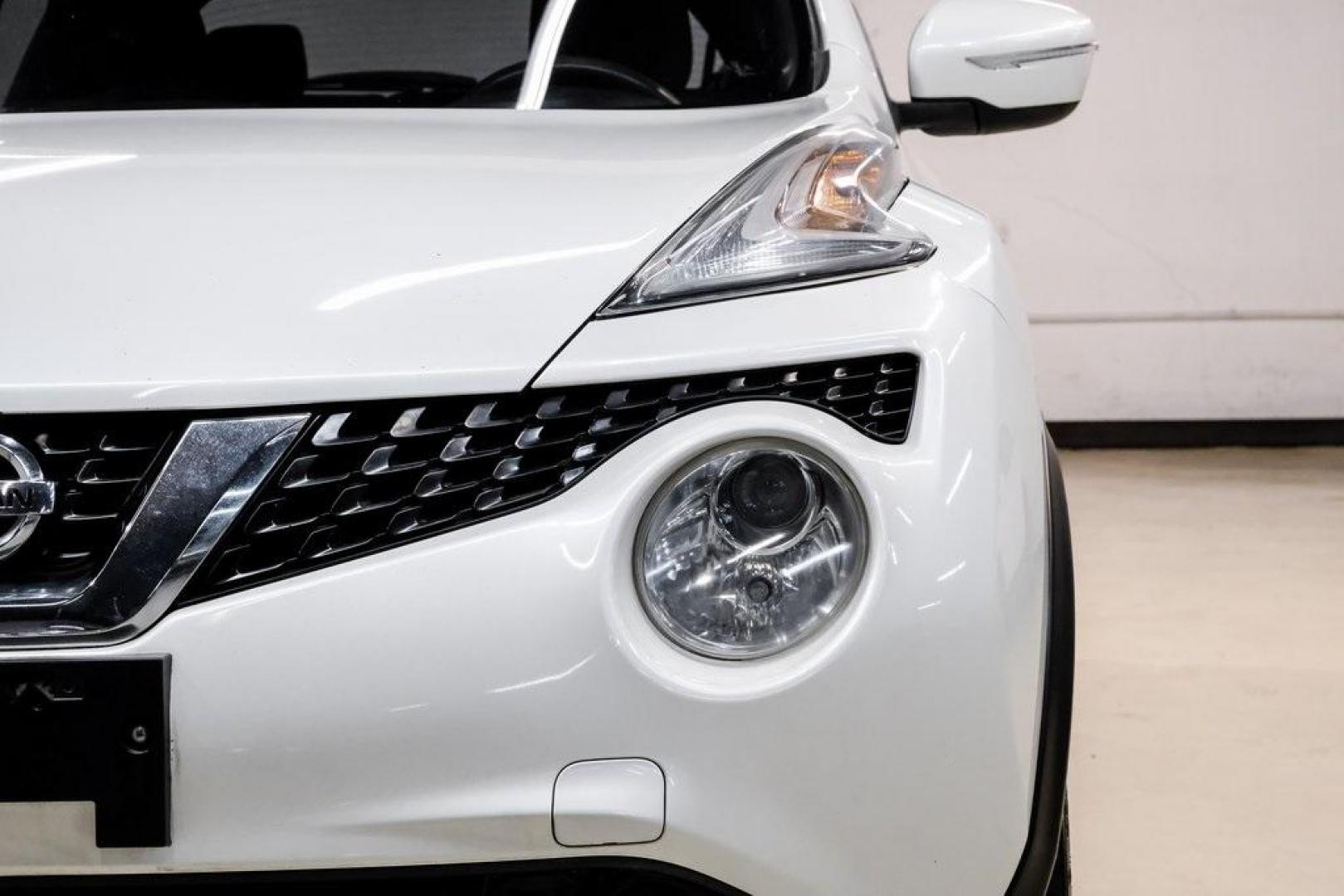 2016 White Pearl /Black Nissan Juke S (JN8AF5MV3GT) with an 1.6L I4 DOHC 16V engine, CVT transmission, located at 15300 Midway Rd., Addison, TX, 75001, (972) 702-0011, 32.958321, -96.838074 - 2016 Nissan Juke S AWD<br><br>Now Available at Midway Auto Group, Addison, Texas<br><br>Bold, compact, and fun to drive 2016 Nissan Juke S AWD delivers turbocharged performance, eye-catching styling, and the confidence of all-wheel drive. Perfect for city driving, tight parking, and daily commuting - Photo#53