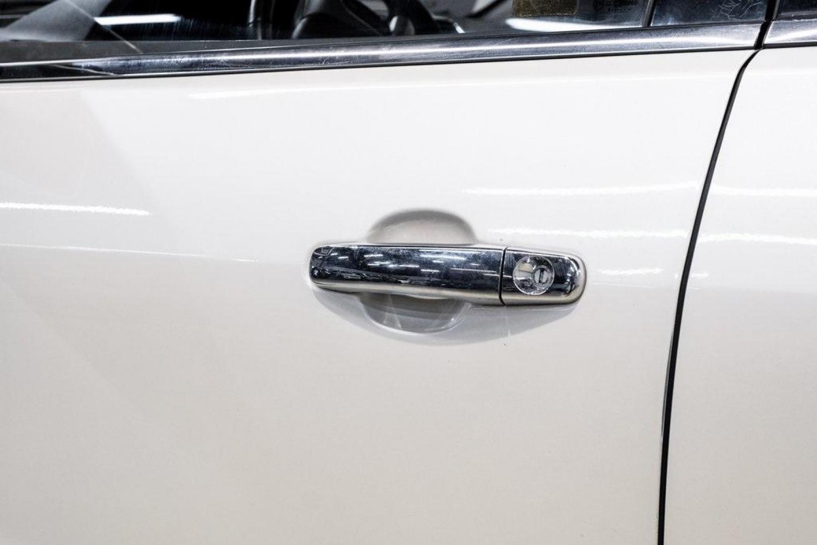 2009 White Diamond Tricoat /Ebony GMC Acadia SLT-2 (1GKER33D19J) with an 3.6L V6 SIDI engine, Automatic transmission, located at 15300 Midway Rd., Addison, TX, 75001, (972) 702-0011, 32.958321, -96.838074 - Photo#56