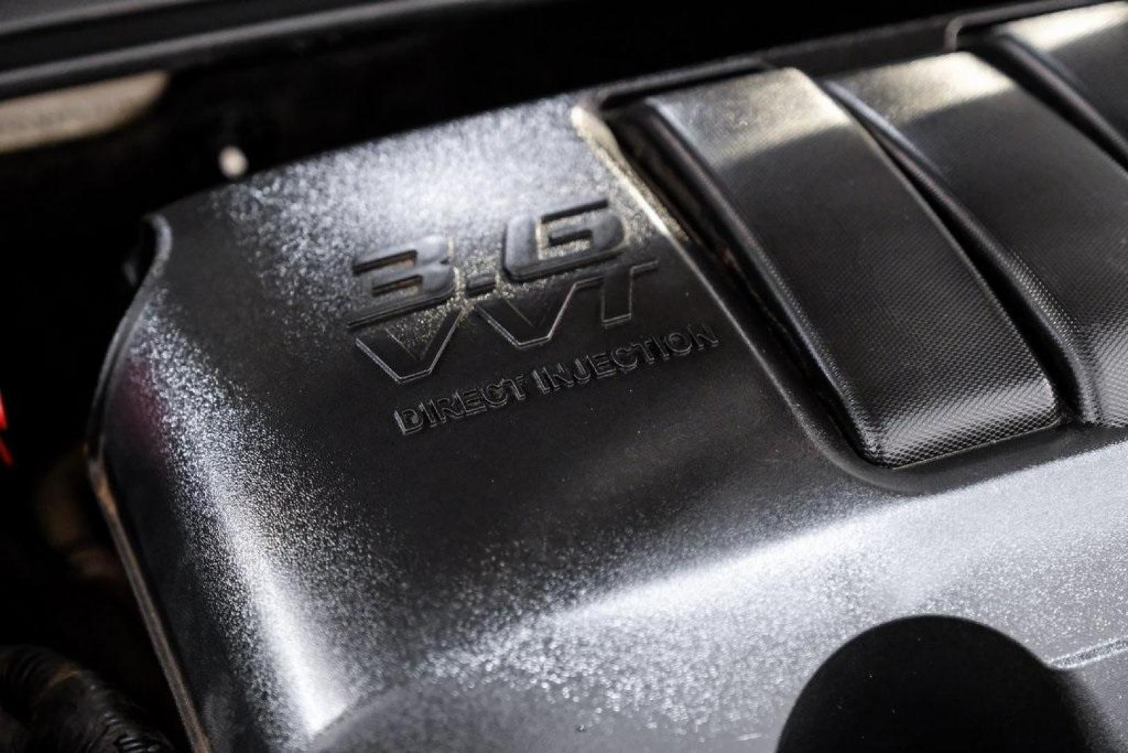 2009 White Diamond Tricoat /Ebony GMC Acadia SLT-2 (1GKER33D19J) with an 3.6L V6 SIDI engine, Automatic transmission, located at 15300 Midway Rd., Addison, TX, 75001, (972) 702-0011, 32.958321, -96.838074 - Photo#67