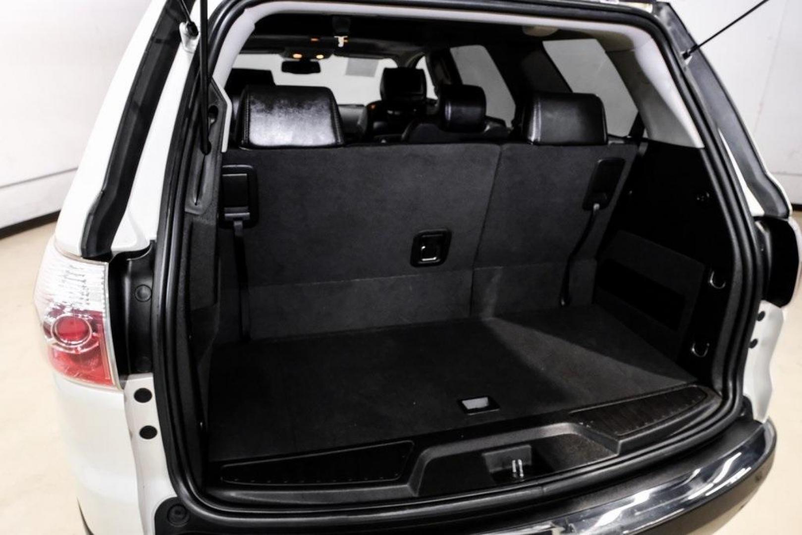 2009 White Diamond Tricoat /Ebony GMC Acadia SLT-2 (1GKER33D19J) with an 3.6L V6 SIDI engine, Automatic transmission, located at 15300 Midway Rd., Addison, TX, 75001, (972) 702-0011, 32.958321, -96.838074 - Photo#70