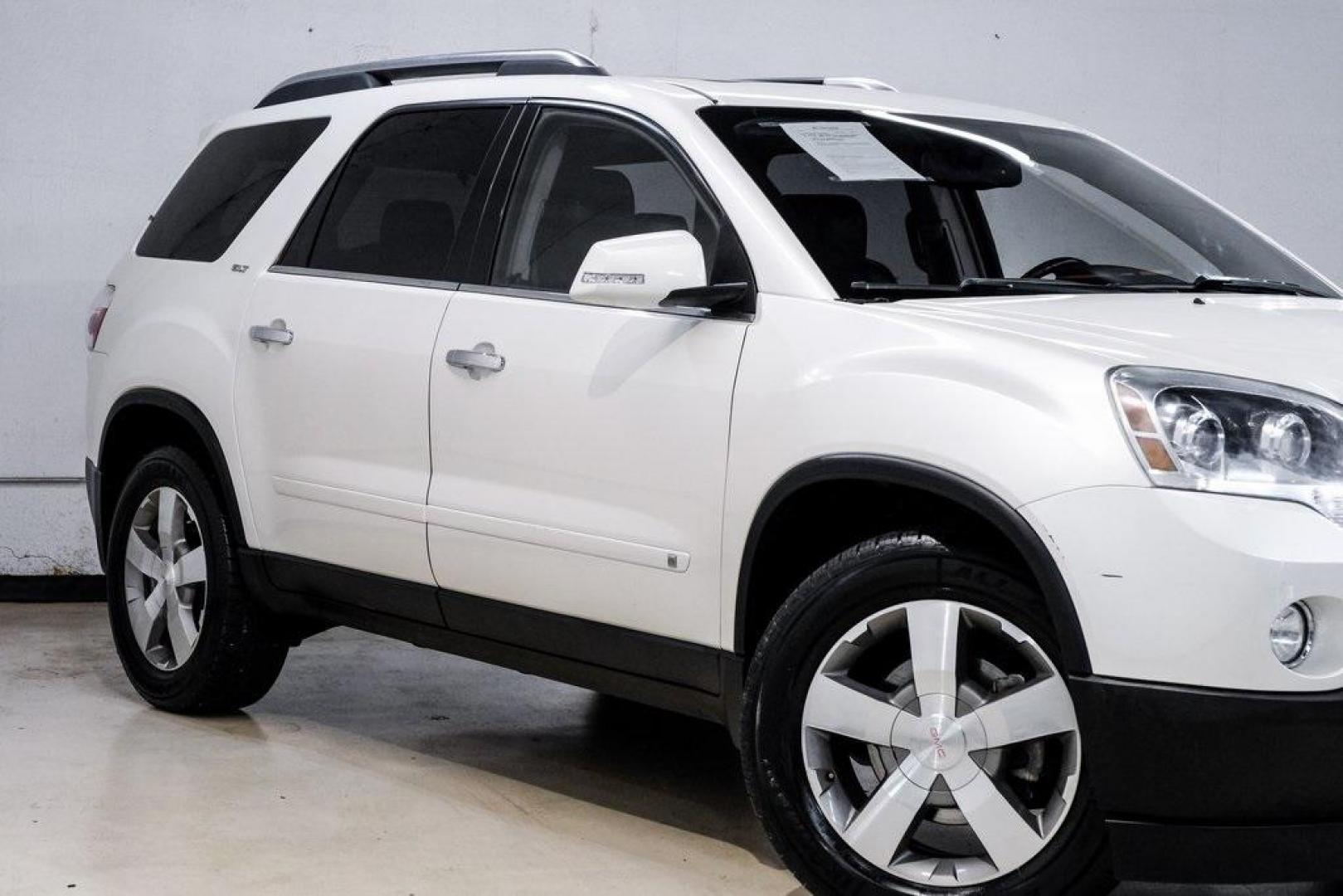 2009 White Diamond Tricoat /Ebony GMC Acadia SLT-2 (1GKER33D19J) with an 3.6L V6 SIDI engine, Automatic transmission, located at 15300 Midway Rd., Addison, TX, 75001, (972) 702-0011, 32.958321, -96.838074 - 2009 GMC Acadia SLT-2<br><br>Now Available at Midway Auto Group, Addison, Texas<br><br>Premium, spacious, and family-readythe 2009 GMC Acadia SLT-2 delivers upscale features, three-row flexibility, and strong V6 performance. As one of the highest trim levels available, the SLT-2 offers luxury-grade - Photo#6